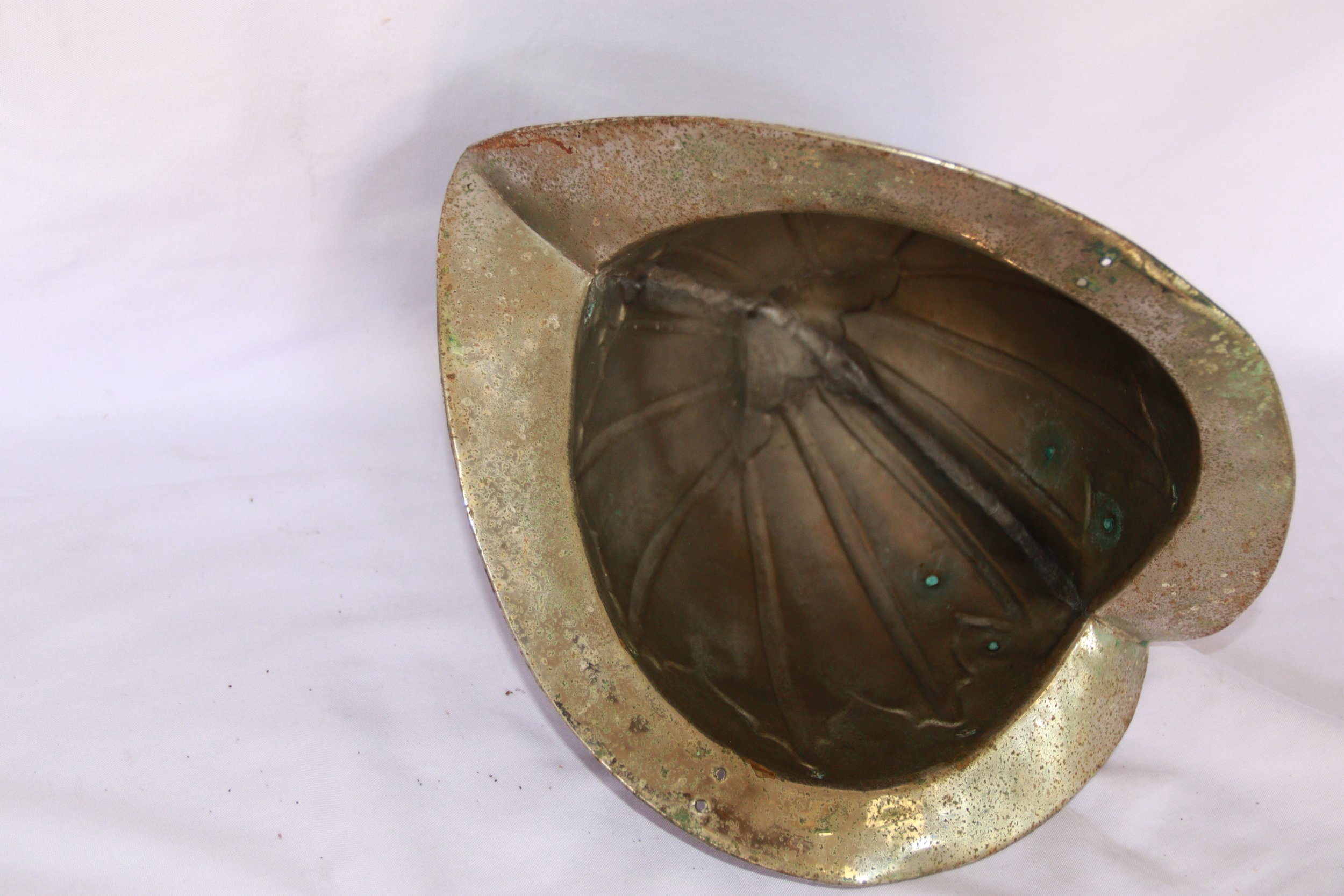 archive number: r-6-014
object reference: 
Bandanese Kapsete
origin: Banda
date: -
notes: Kapsete are traditional helments and a central component of Banda's customary attire. They originate in early interactions with Portuguese expeditions, but now 