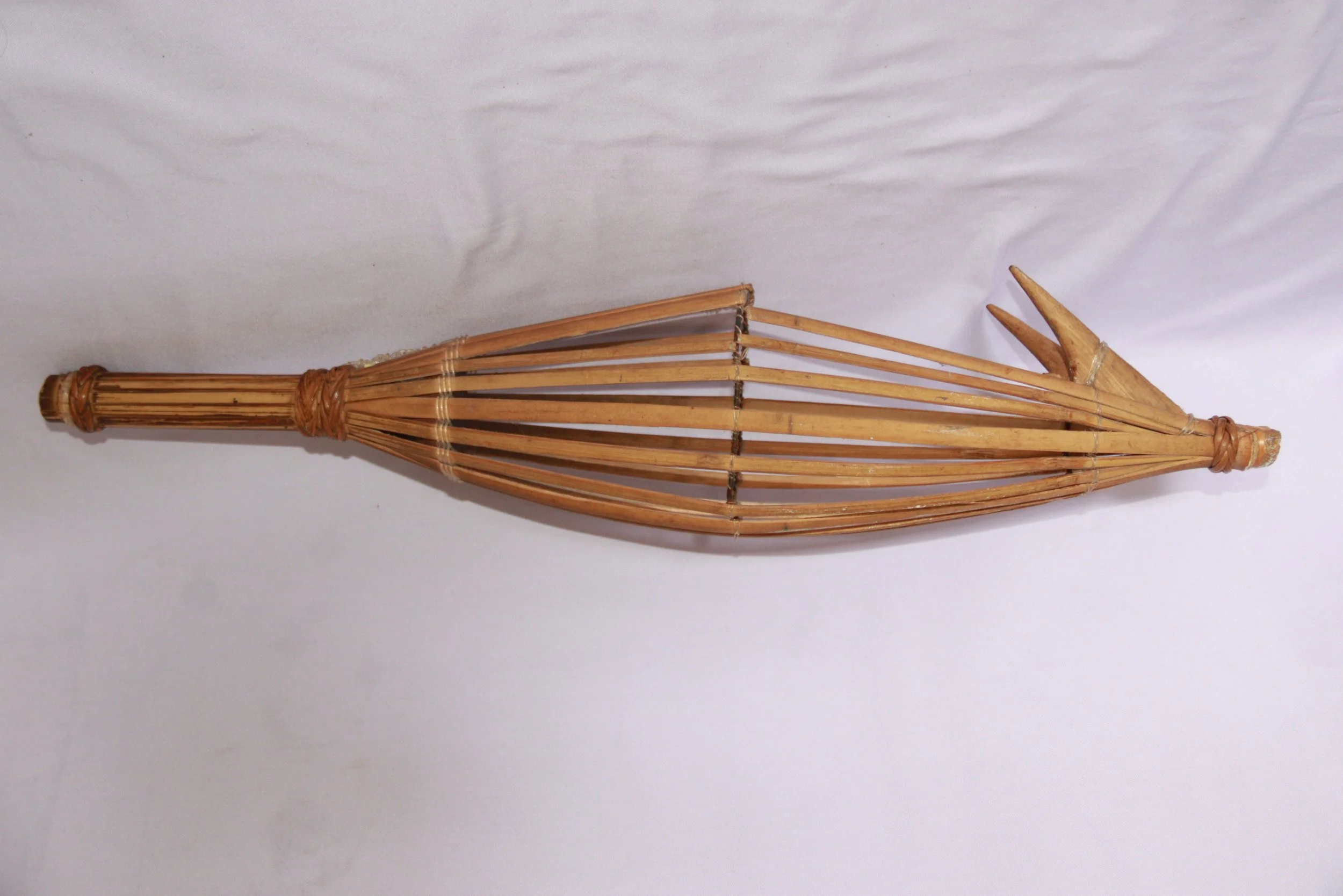 archive number: r-2-003
object reference: Maimai Bubu
origin: Banda 
date: - 
notes: A traditional harvesting tool used by the Bandanese people to harvest nutmeg, walnuts, and cloves. Today, the Maimai is one of Banda's most iconic items.