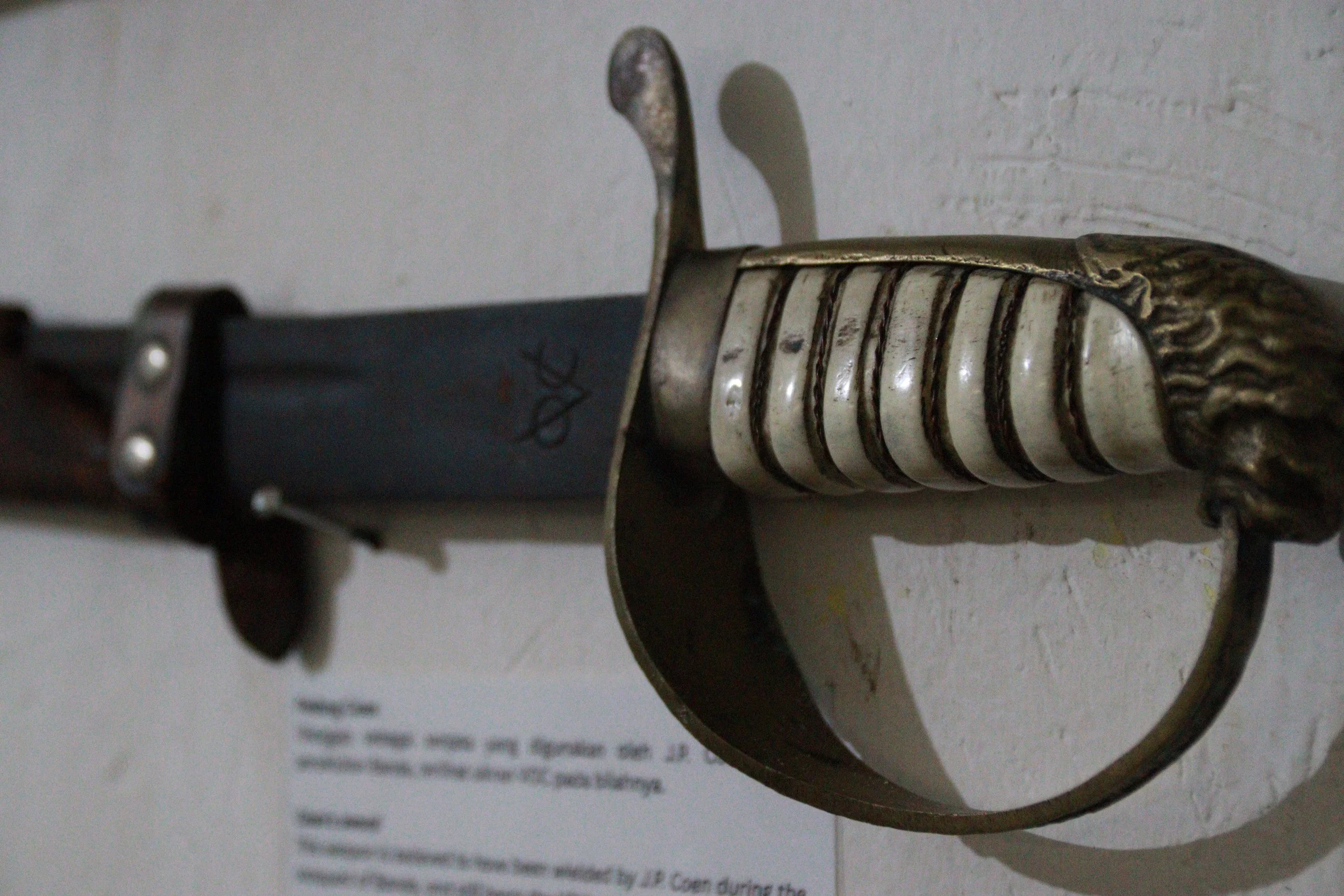 archive number: r-3-020
object reference: 
Coen's sword
origin: Europe
date: -
notes: This cutlass-style sword is engraved with the VOC (Dutch East India Company) logo, and is believed to have belonged to Jan Pieterszoon Coen, the Dutch officer who e