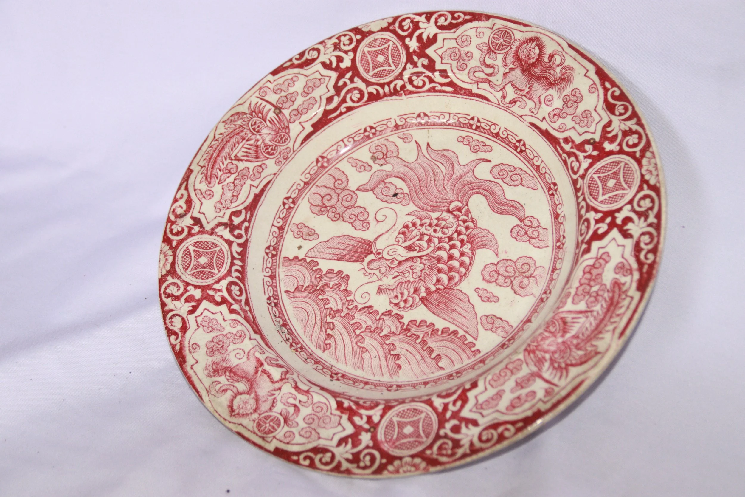archive number: r-2-020
object reference: 
Large Ceramic Plate
origin: China (assumed)
date: -
notes: Antique plate in the 'Chinoiserie' style, which is a European decorative style inspired by Chinese and other East Asian art and design.