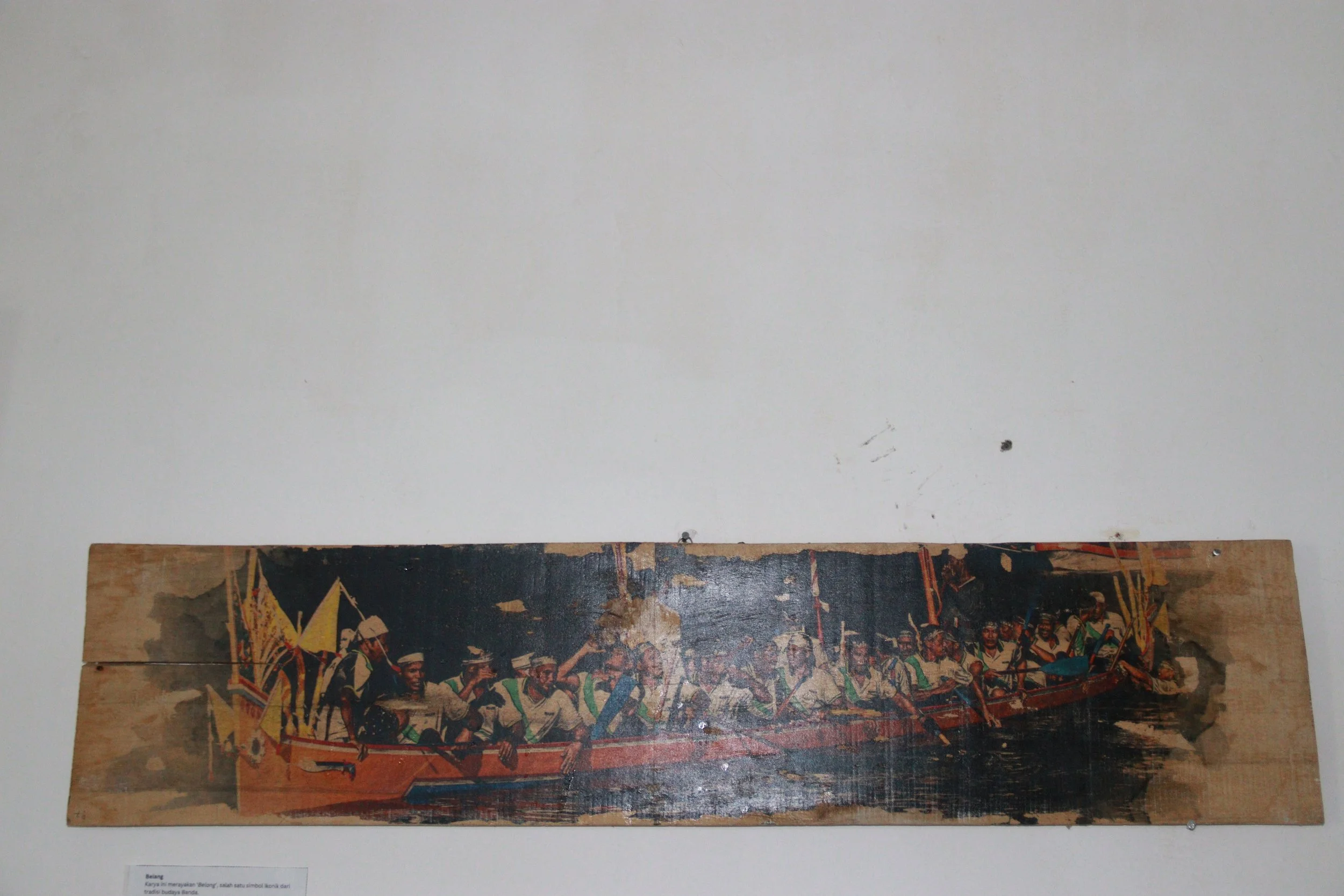 archive number: r-6-011
object reference: 
Belang Rowing Photo on Wood
origin: Banda
date: -
notes: Belang are customary rowing boats used for centuries in Banda for a range of purposes, including naval warfare, ritual, racing and cultural events. Th