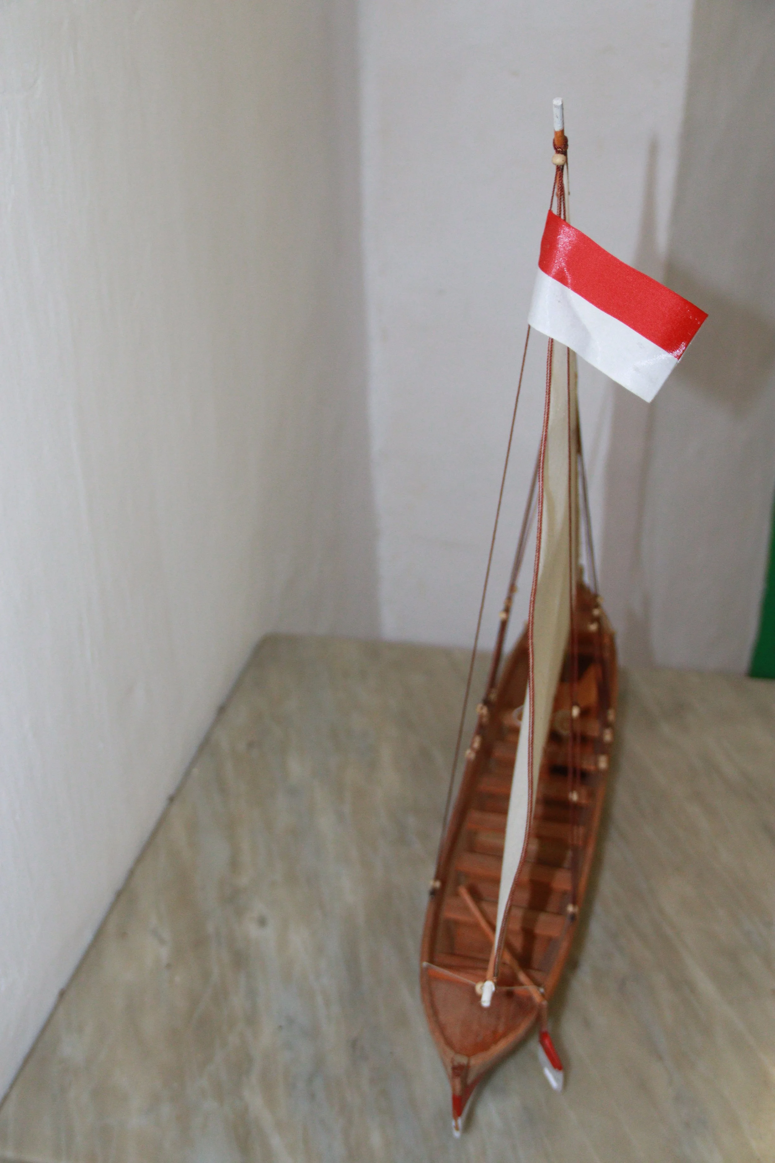 archive number: r-5-001
object reference: 
The Boat Named "Indonesia"
origin: Banda
date: -
notes: This ship represents two boats, owned by Mohammad Hatta and Sutan Syahrir, which they commissioned while in exile in Banda. Syahrir's boat was given th