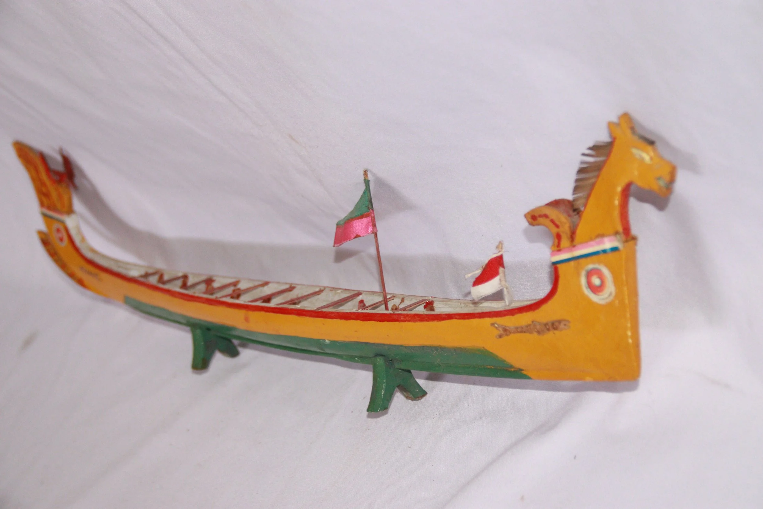 archive number: r-6-004
object reference: 
Belang Kampung Adat ____ Model
origin: Banda
date: 
notes: Belang are customary rowing boats used for centuries in Banda for a range of purposes, including naval warfare, ritual, racing and cultural events. 