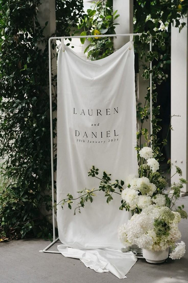 This draped fabric welcome sign is a real classic….jpeg
