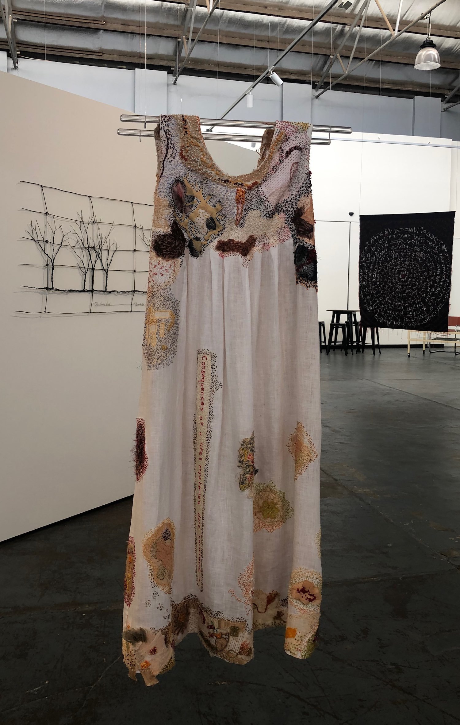 Real bodies have their lives stitched into them: Burial frock (back view), 2022. WAFTA TwentyFIVE+ crossover exhibition. Janet Holmes à Court Gallery, West Perth. Photograph Joy DENISE SCOTT
