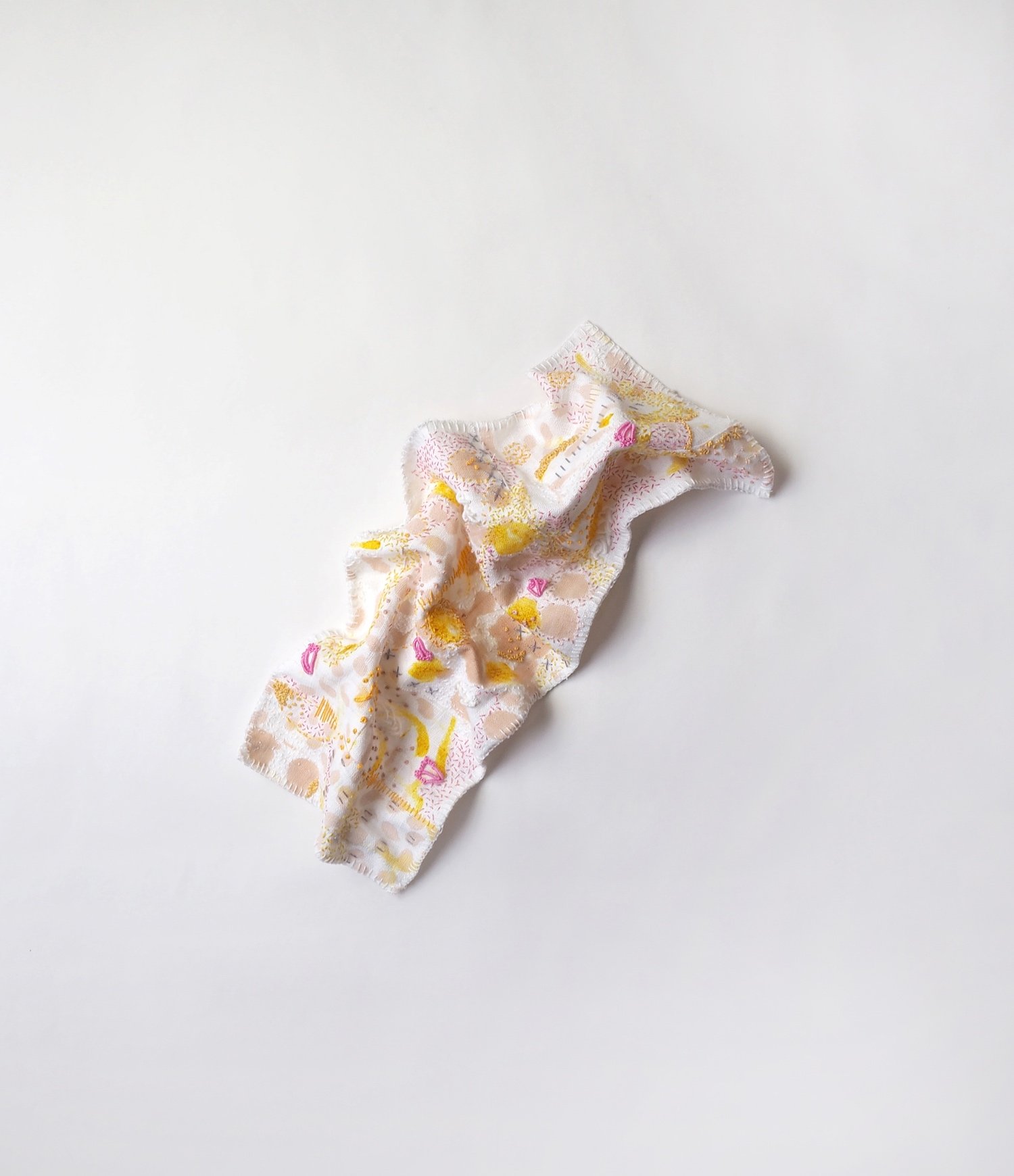 Wave of feeling 1, 2021. Embroidery, collage and wire on linen. 510mm. 200mm. Photograph Jae Criddle.