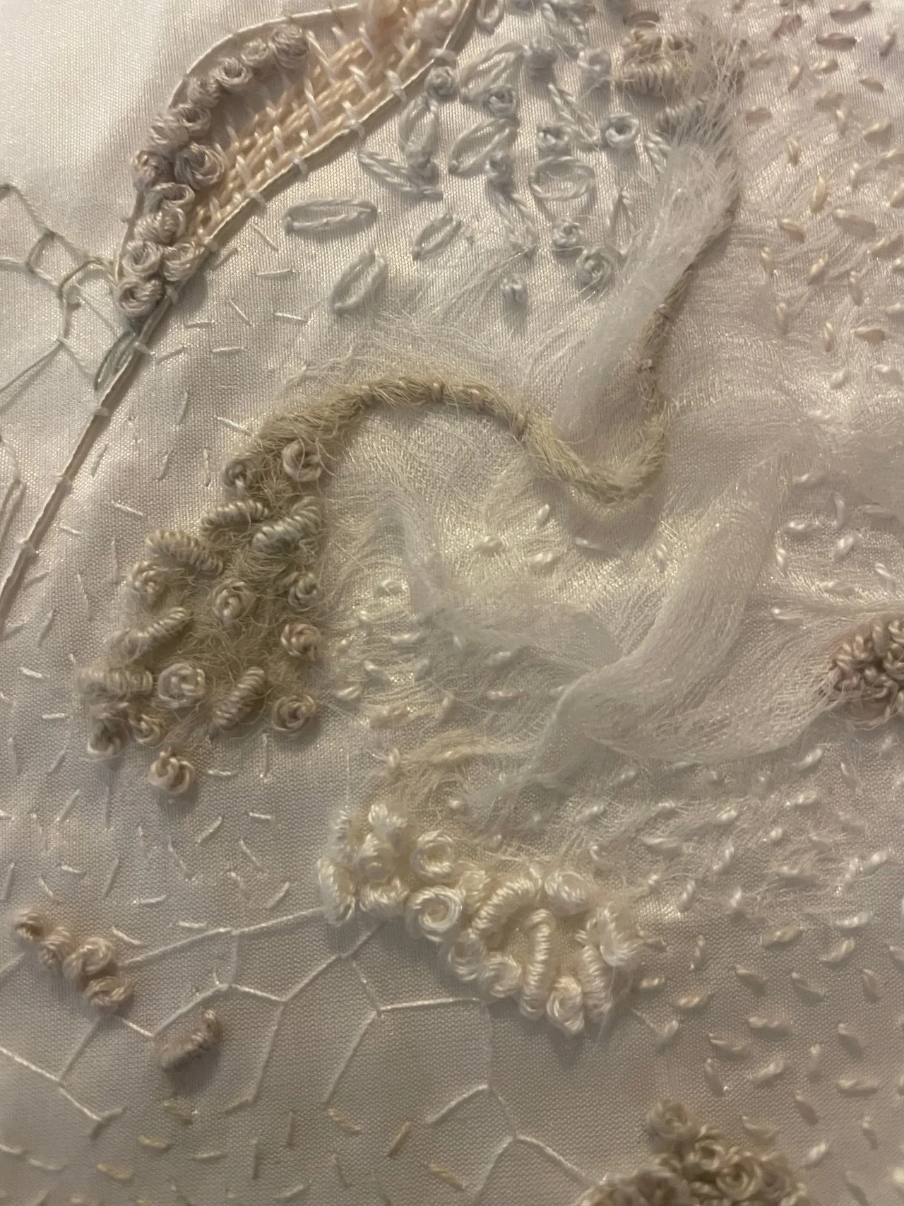 Adornment 2, (detail) 2025. Embroidery, appliqué and collage on silk. Size 41.5 cm x41.5 cm. Photography Joy Denise Scott