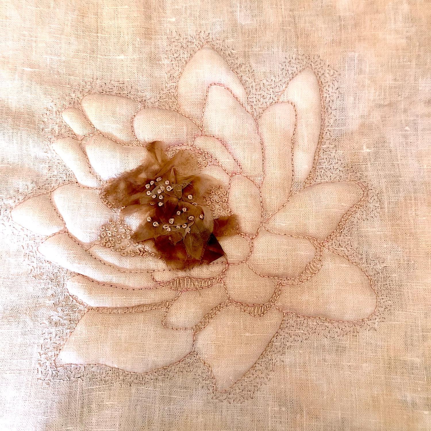 Spirit rising, 2022. Trapunto on onion skin dyed linen and silk organza. 338 x 330mm. Photograph Joy Denise Scott.