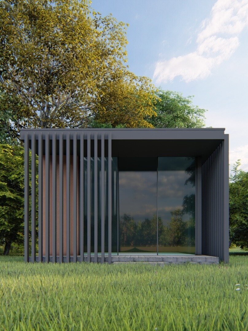 Modern garden pavilion with glass and metal slatted walls, surrounded by trees and grass, under a blue sky.