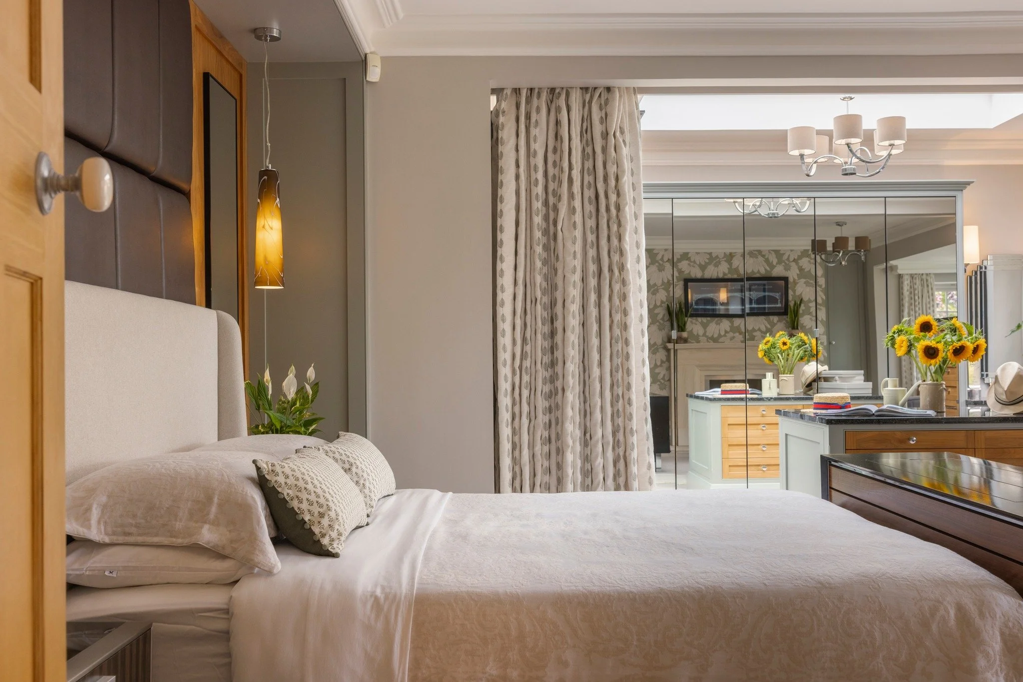 🌙 Bedroom beauty, redefined.

Soft textures, bespoke joinery, and natural light come together in this stunning master suite. From the upholstered headboard wall to mirrored dressing cabinetry and the cosy lounge corner, every detail has been designe