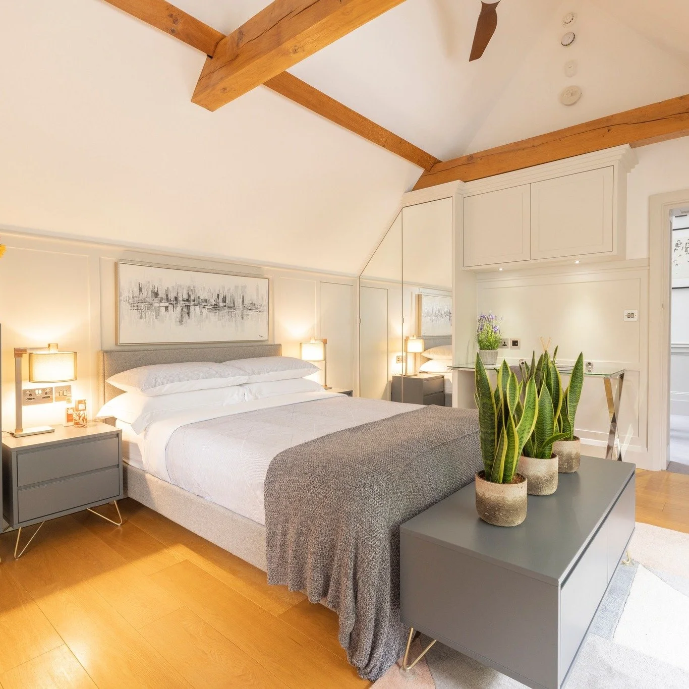 ✨ Light, lines, and luxury. ✨

Exposed beams, layered textures, and a dreamy window seat bring depth and character to this bespoke bedroom. With built-in storage, a sleek workstation, and soft, natural finishes, it&rsquo;s proof that practical design