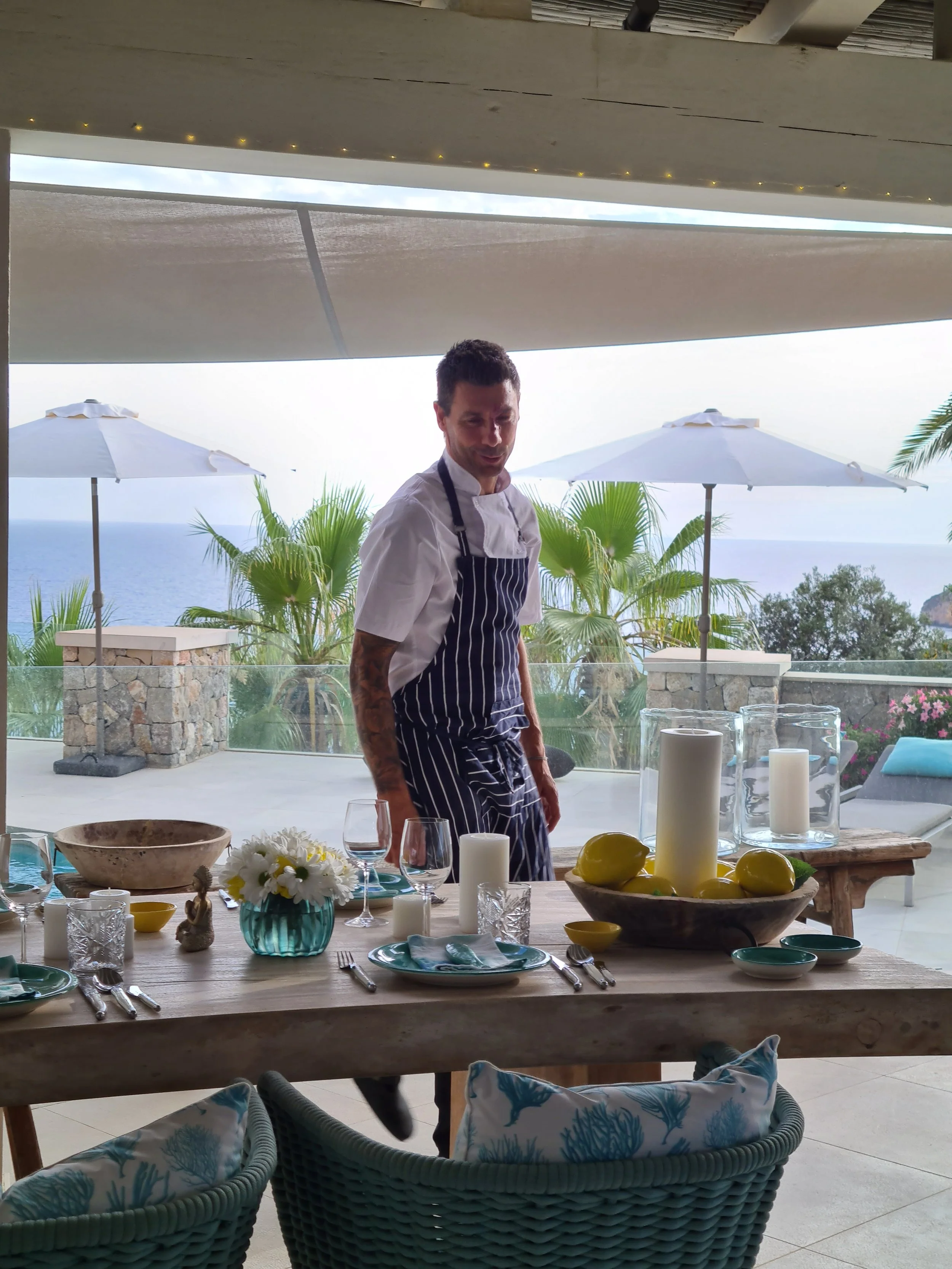 Luxury private dining table setup by a private chef in Mallorca at a villa terrace