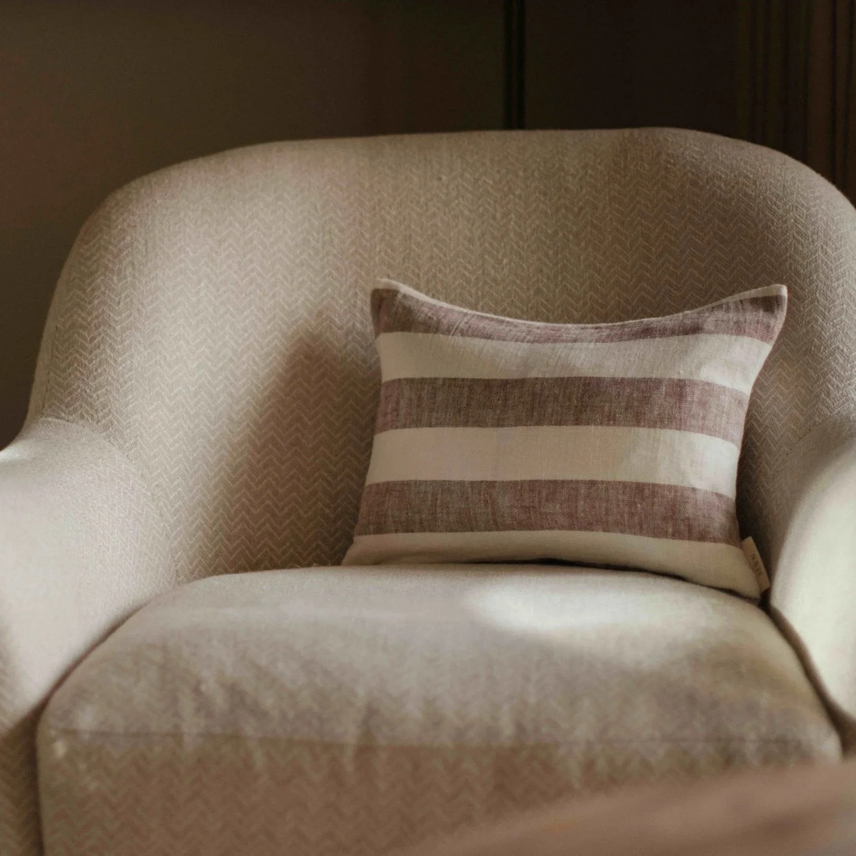 lina-brown-striped-cushion.jpg