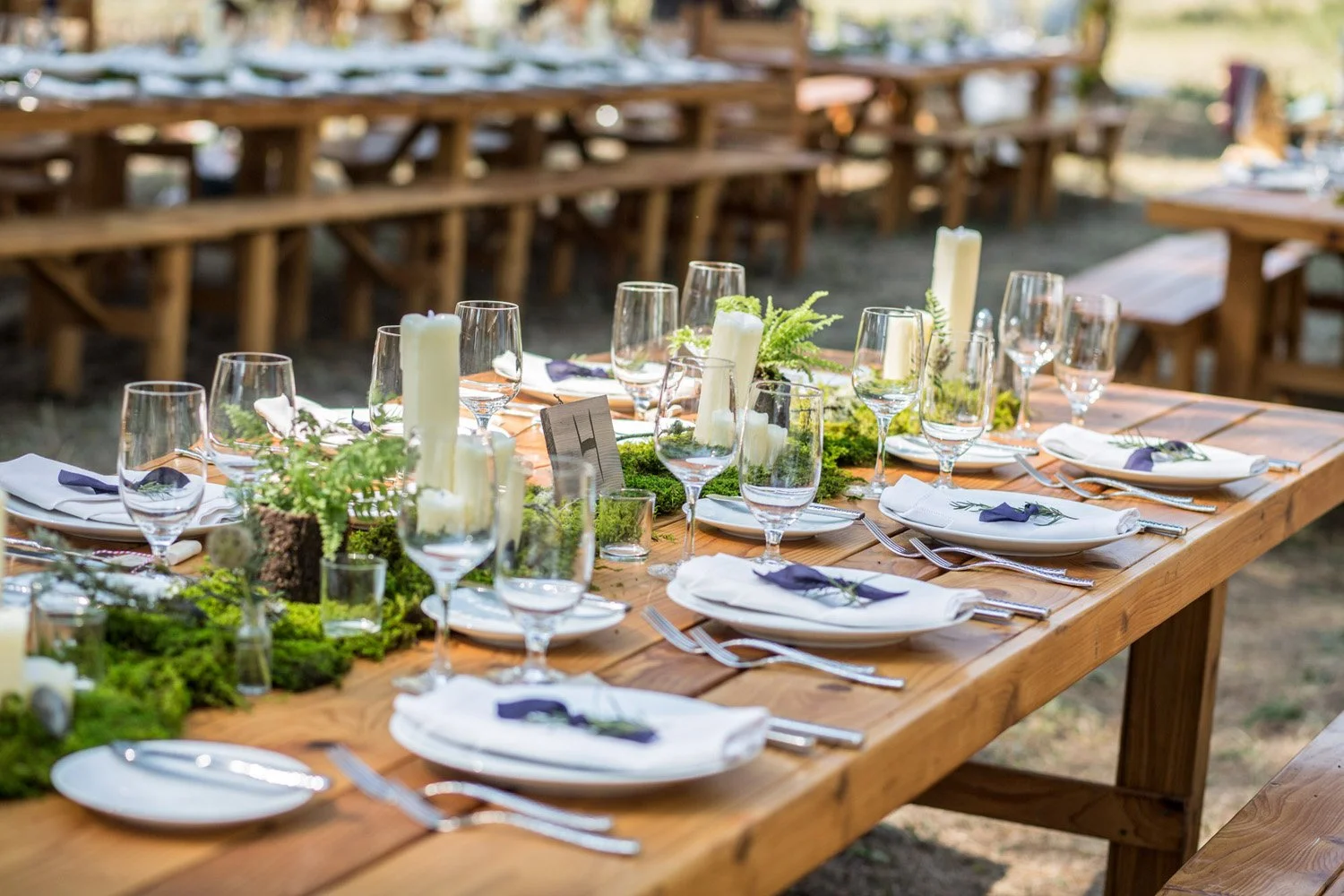 The wedding tables are beautifully laid out and designed by Simply Wed, waiting for the guests to sit down for their wedding meal.