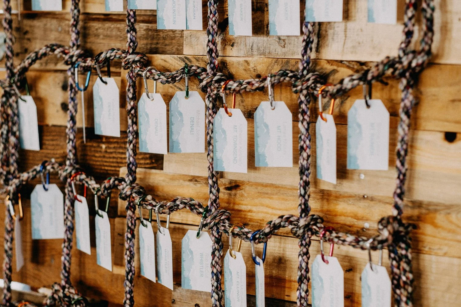 A creative wood climbing-inspired seating chart with hanging notecards at the Golden Gardens Bath House-Photography by Dylan M Howell Photography-planned and designed by Simply Wed