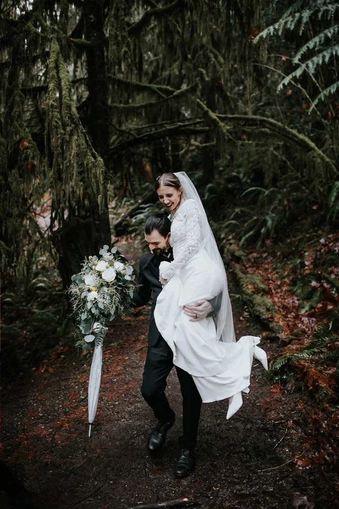 The bride and groom playing piggy back in a playful moment at the Alderbrook Resort-Photography by Nick plus Danee Photography.-planned and designed by Simply Wed