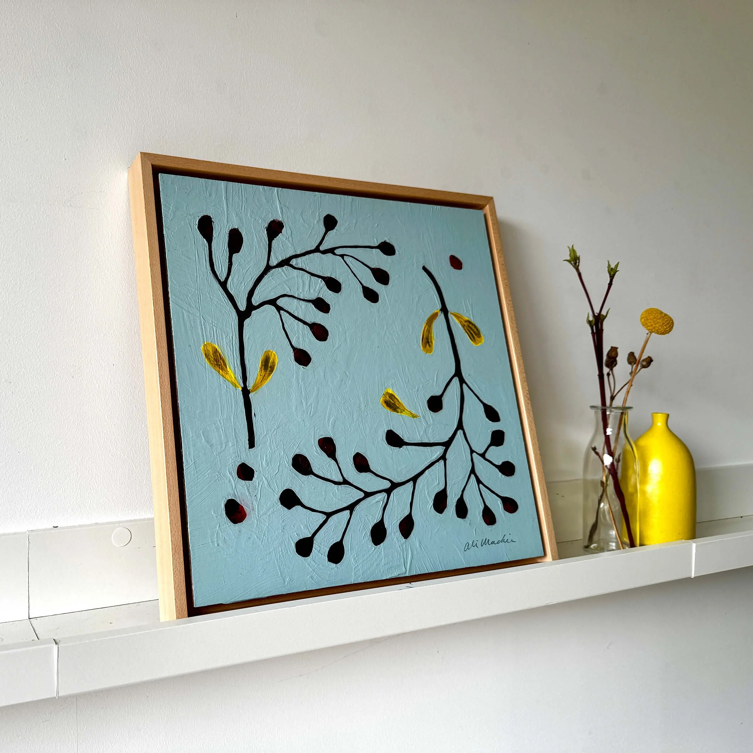 Ali Mackie Art Lets Wait Together - Wreaths sky blue red and yellow art on shelf for sale