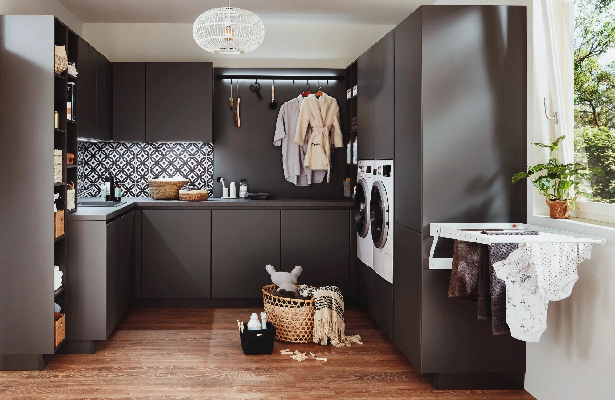 dark handleless kitchen with smart storage 