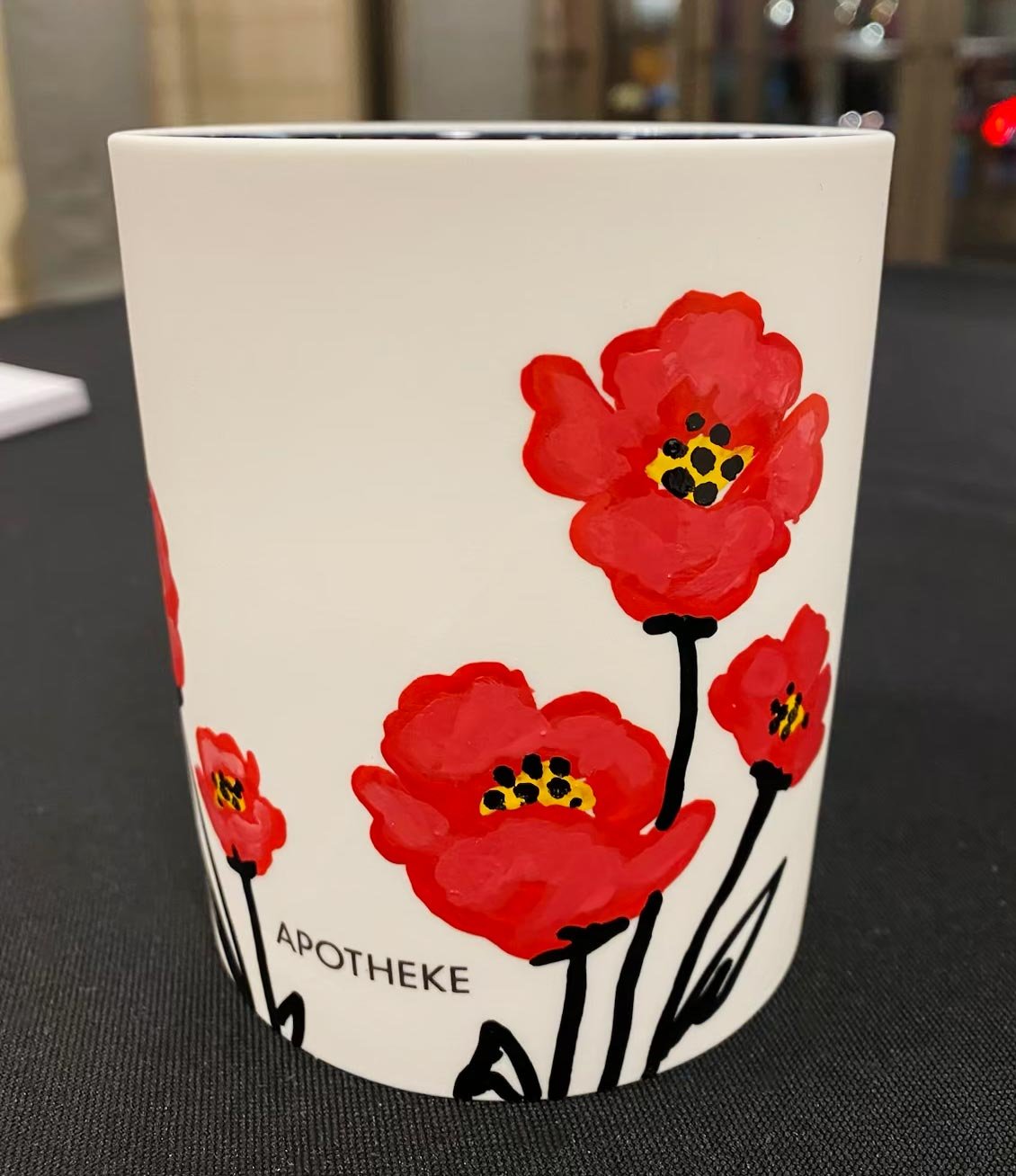 Floral painting on Apotheke Candle for store activation event in DC