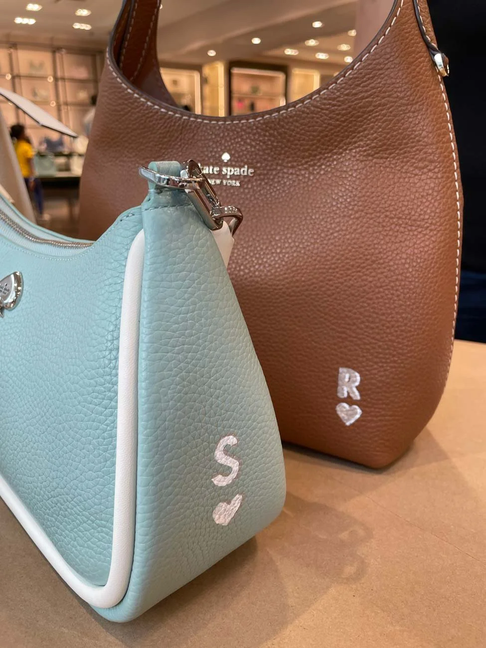 Live bag painting activation in Houston, Texas for Kate Spade