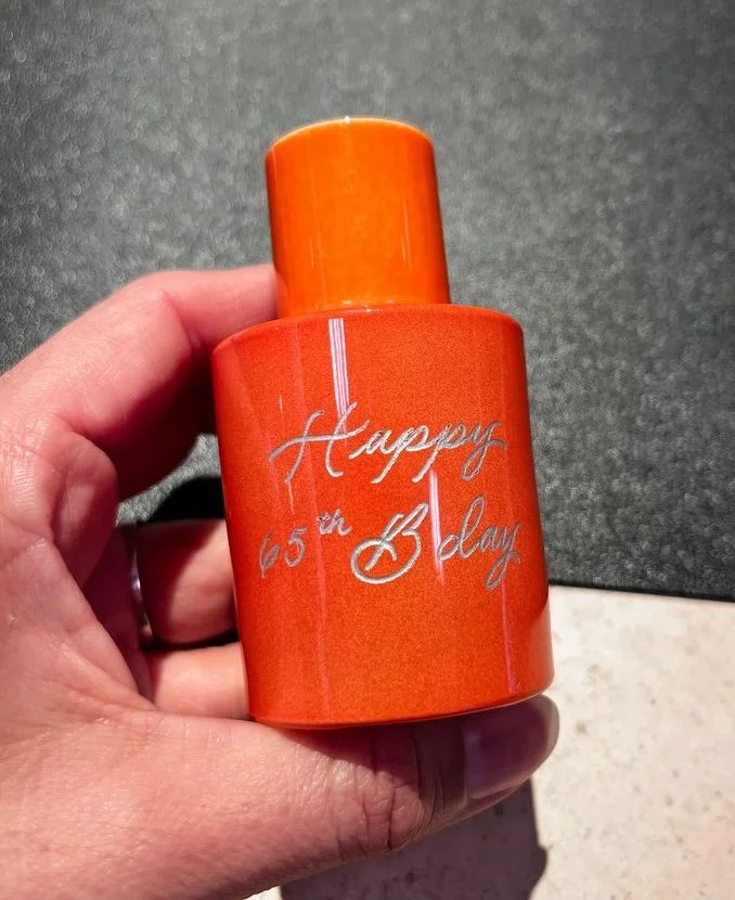 Perfume bottle engraving and customization brand activations