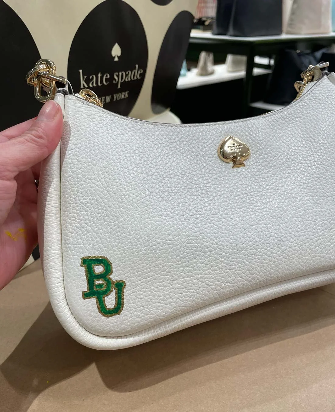 Live bag painting activation in Houston, Texas for Kate Spade