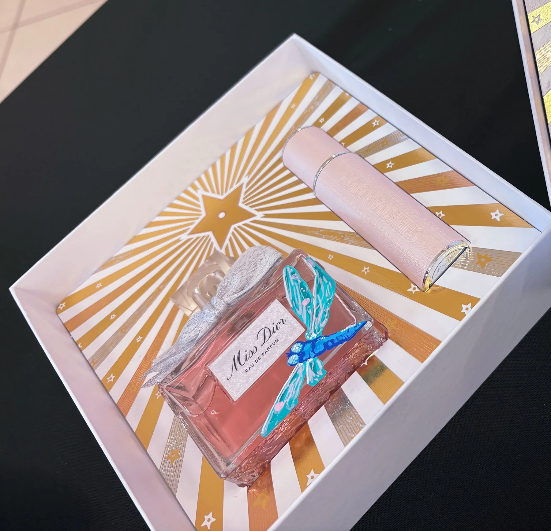 In store brand activation fragrance bottle painting for Dior and Nordstrom