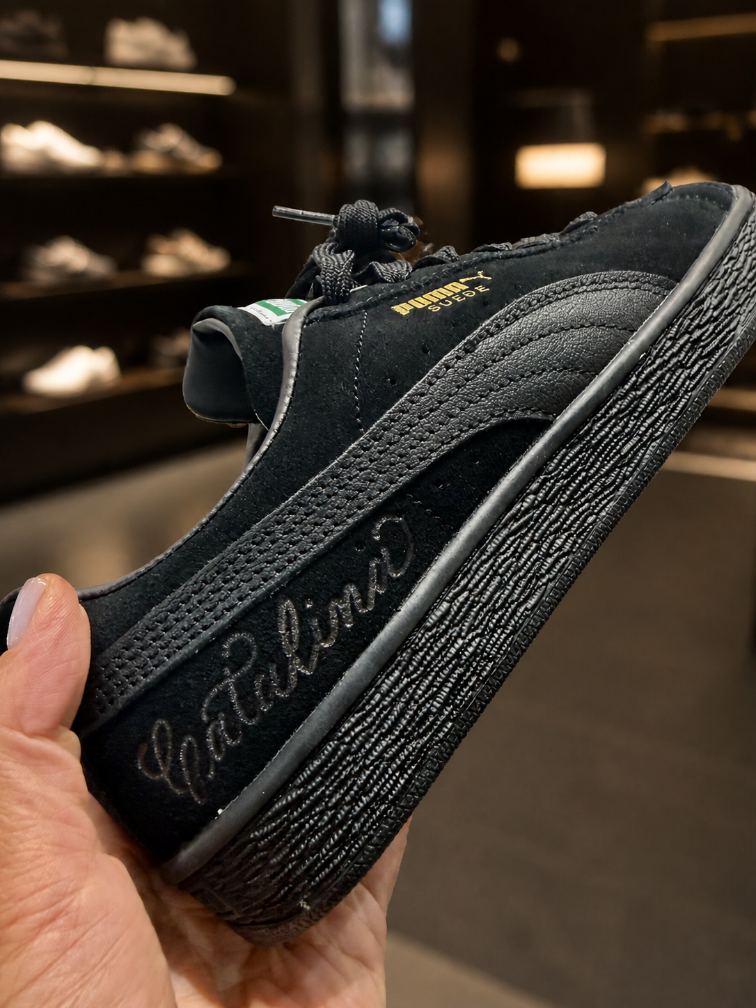 Puma brand activation - Custom suede etching with a hot burning tool for lettering, calligraphy and artistic personalization in store