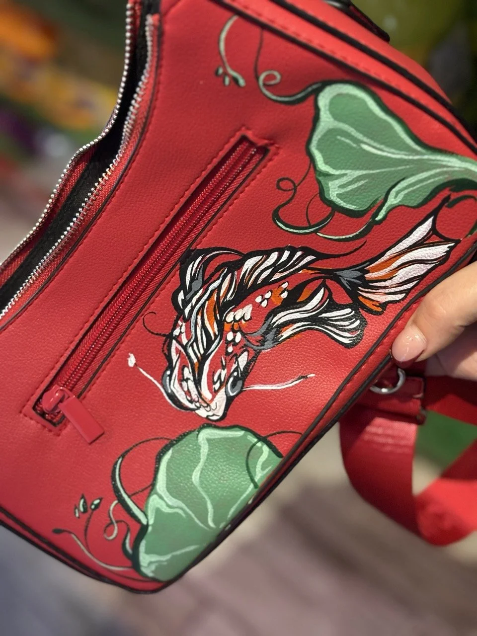 Leather bag painting for brand activation in-store events nationwide