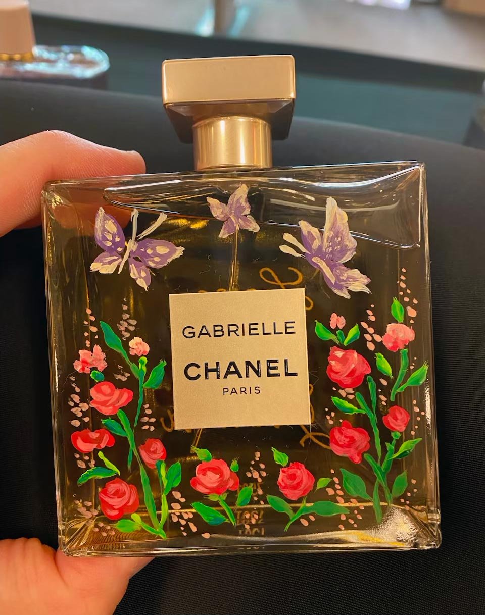 Chanel perfume bottle painting at live store event in DC, Virginia region