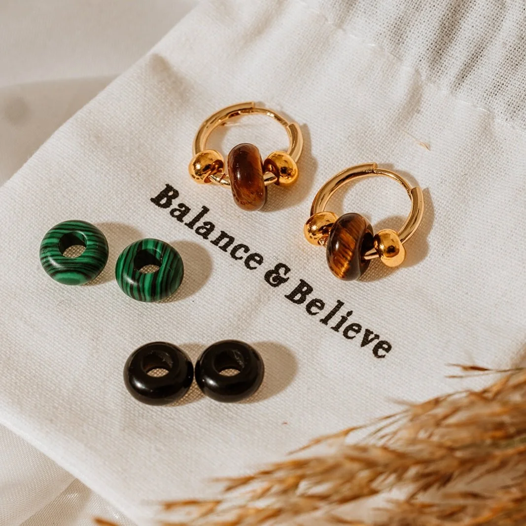 Winter Luxe Huggies 

Change your vibe with interchangeable gemstones, Tiger&rsquo;s Eye for confidence, Malachite for balance, Black Obsidian for grounding. Wear the one that matches your mood. 

Also available in silver and the perfect gift if you 