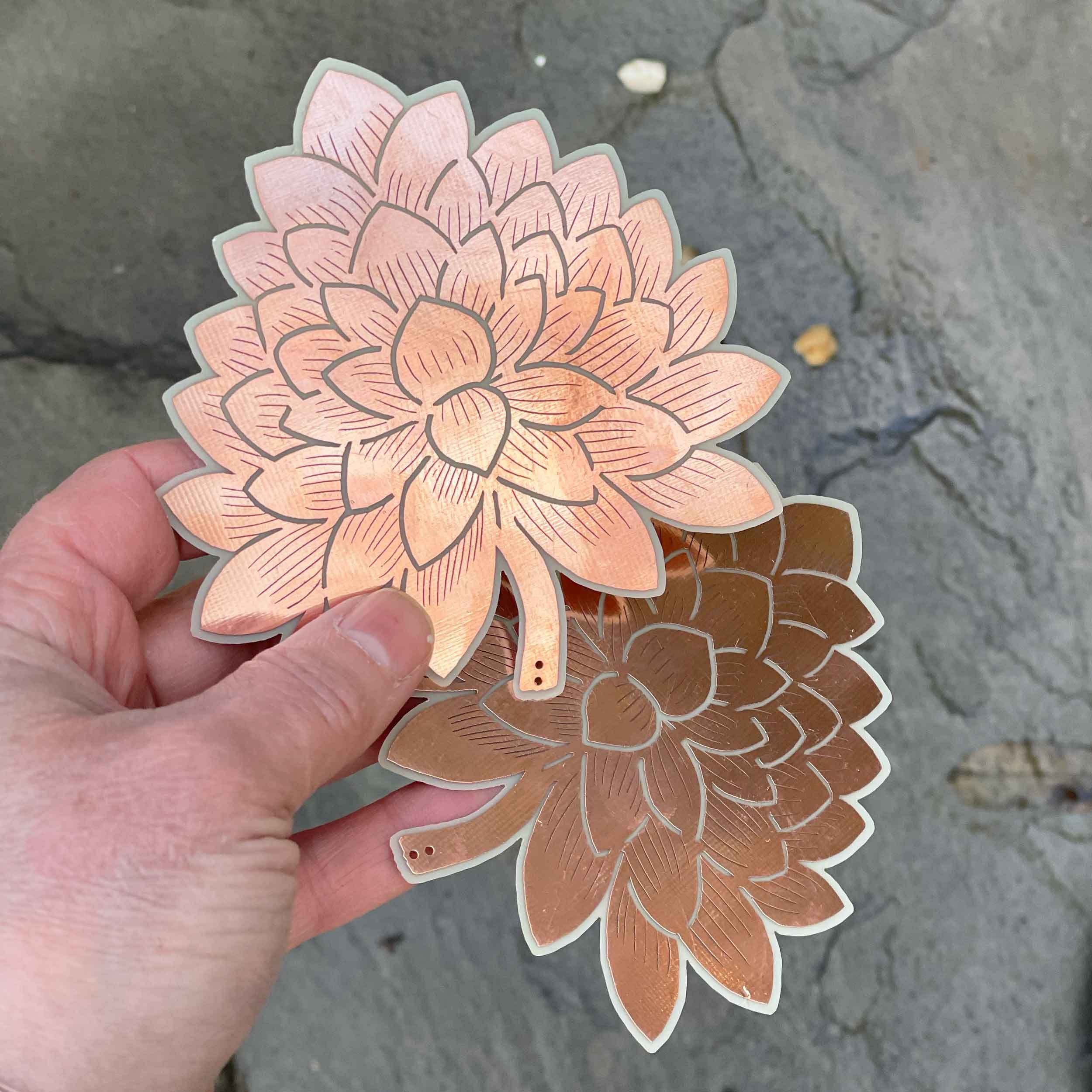 Copper capacitor plates in the shape of lotus blossoms