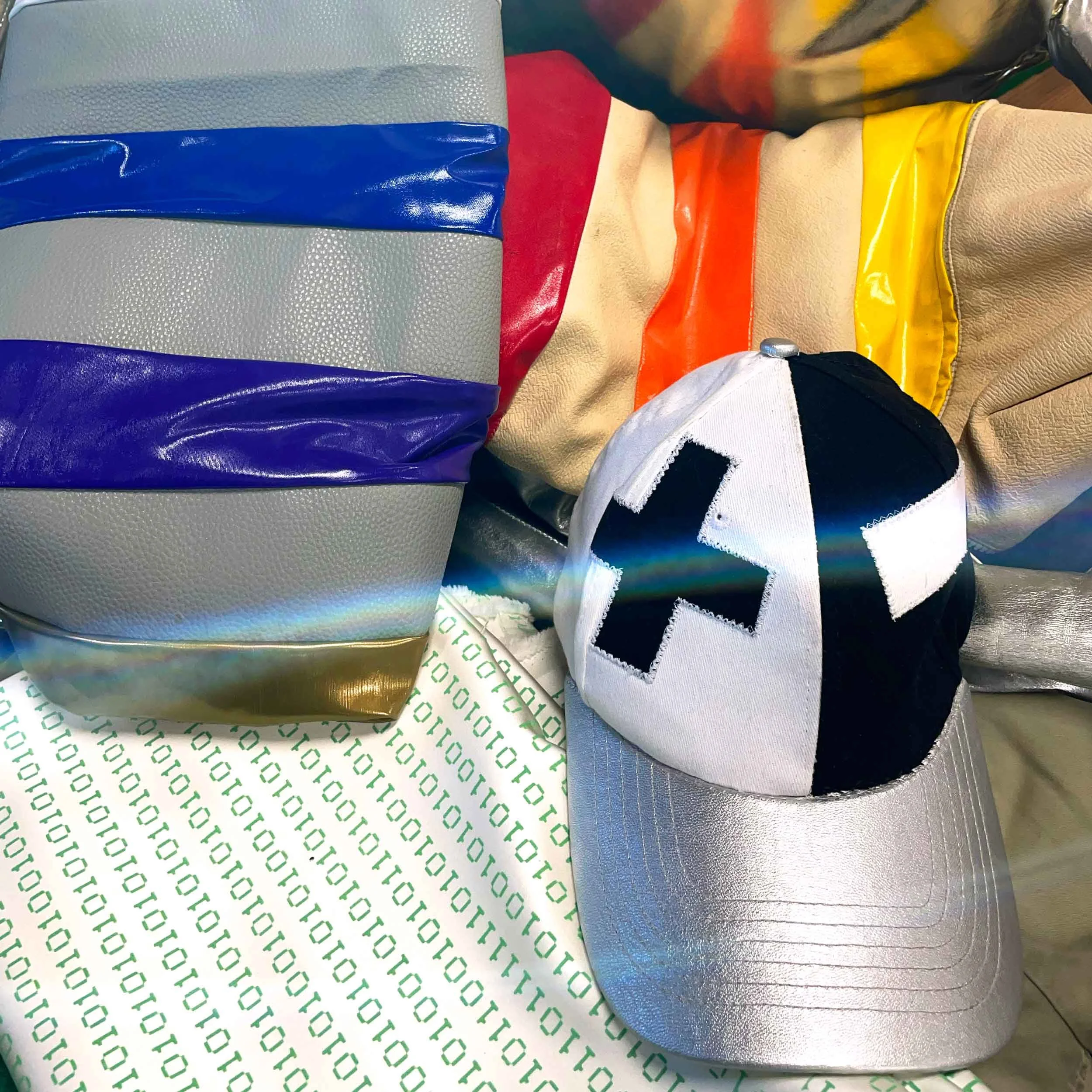 Kelly Heaton's bipolar cap, digital fabric, and resistor back packs