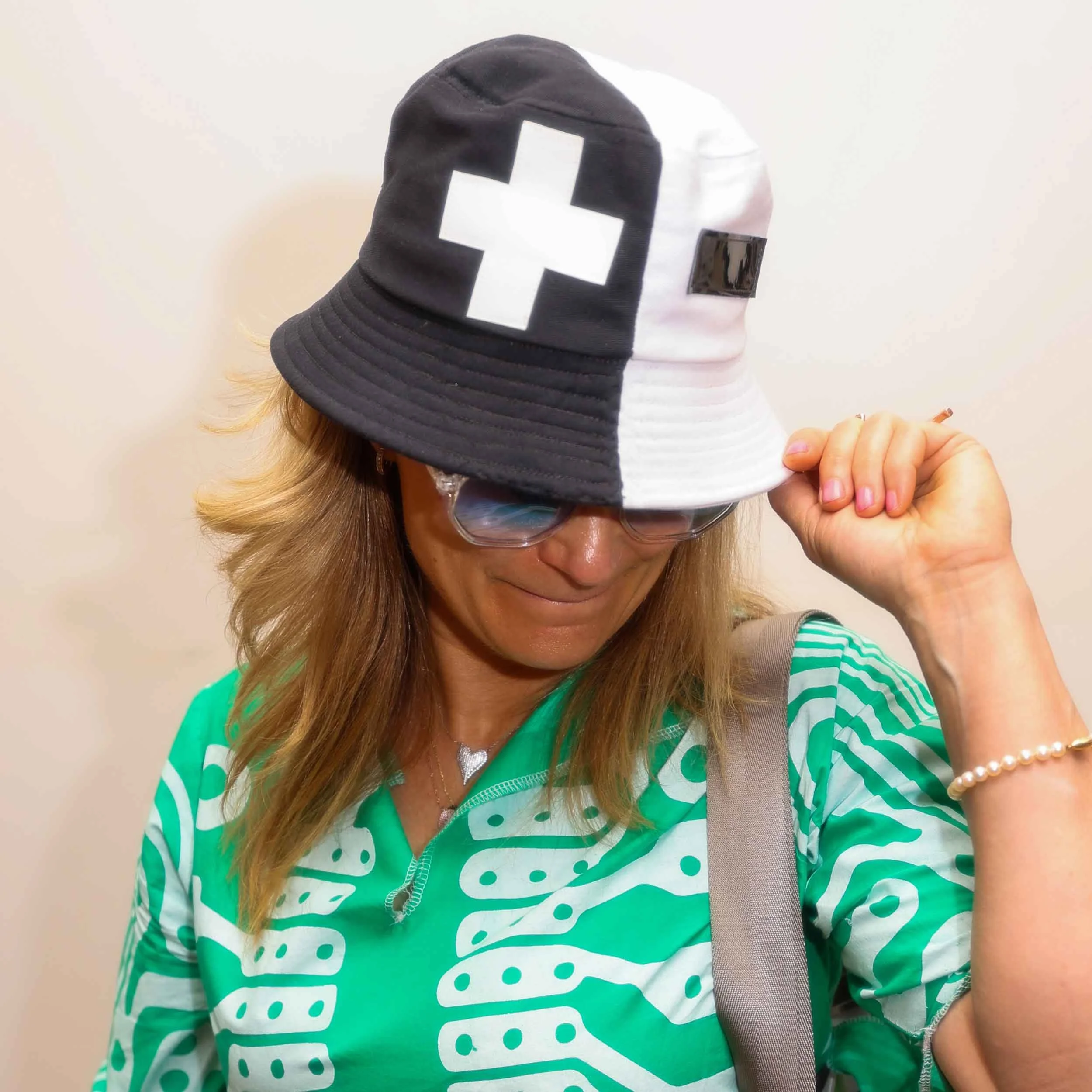 Kelly Heaton wearing a bipolar bucket cap