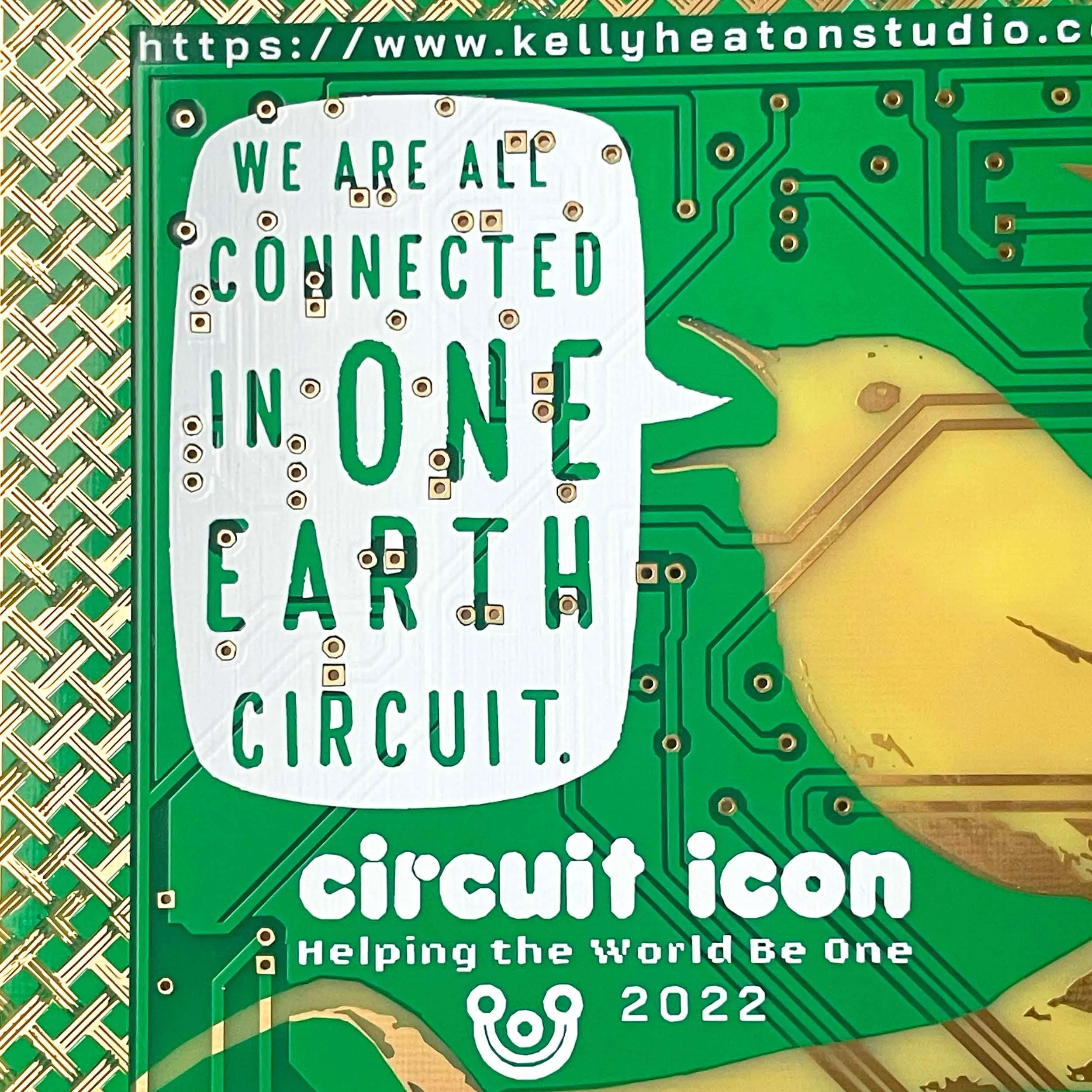 Reverse of Pretty Bird circuit board, "We are all connected in one Earth circuit."