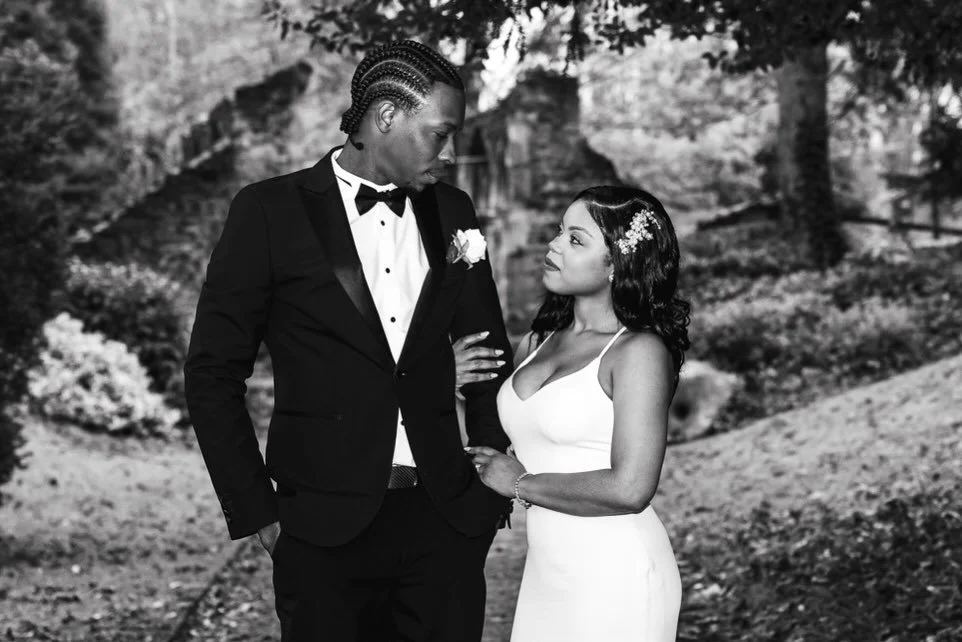 First, the pause.
A moment to look at each other, take it all in.
Then the fun kicks in &mdash; lifted feet, laughter, and that we&rsquo;ve actually done it feeling.
Same couple. Same love. Just different moments.
#BlackAndWhiteWedding #RealWeddingMo