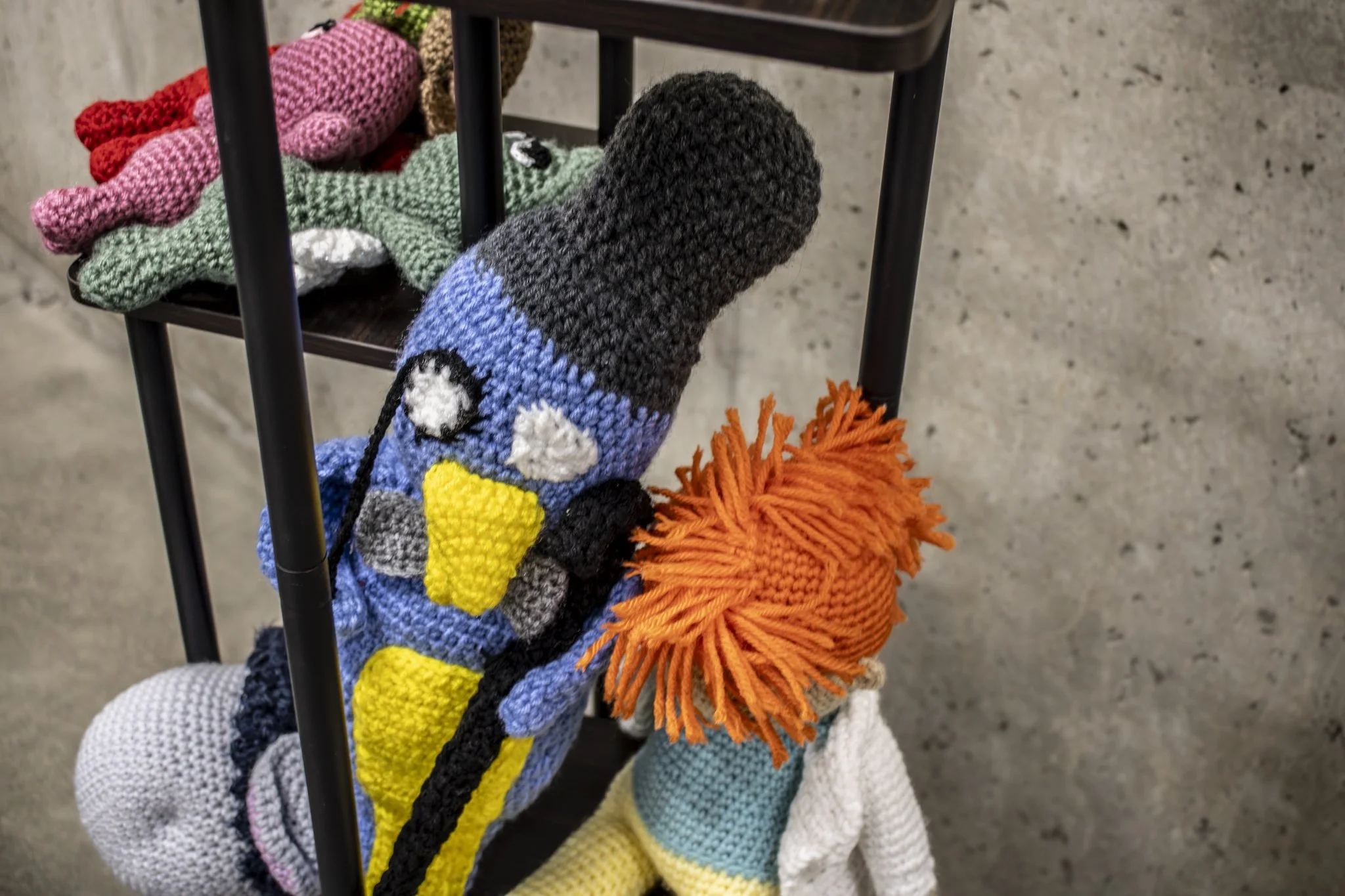 A crocheted penguin displayed as part of the Inside Vision art show.