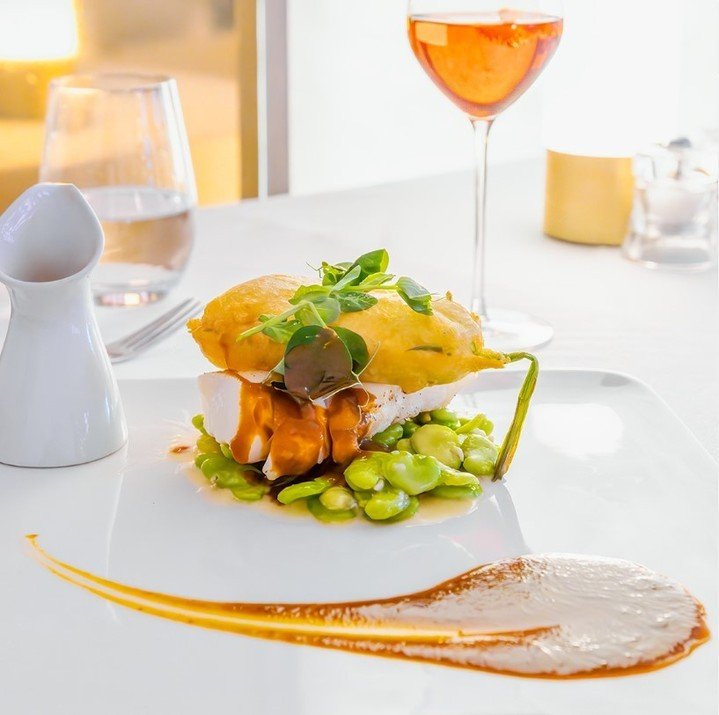 🐟 Our Slow Baked Chilean Sea Bass, served with a Bandol Saffron Pistil Sauce, Basil Fava Bean &Eacute;touff&eacute;e, and a Zucchini Blossom Beignet.

#SeaBass #Saffron #Etouffee #TasteOfHouston #HoustonRestaurants #ChefDriven #Houstonfoodies #Houst