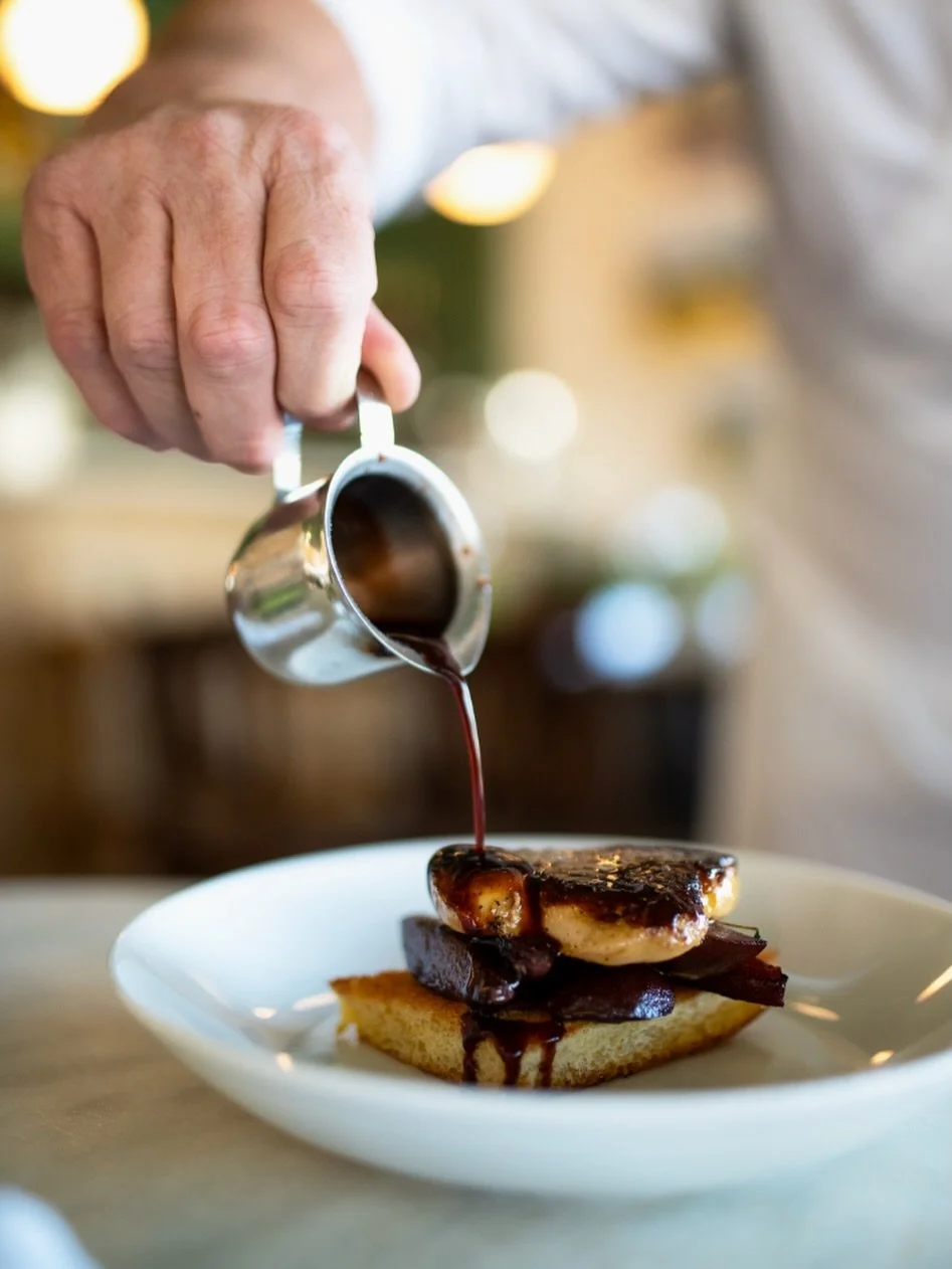 Pan-seared foie gras with a golden crust and silky center, served on buttery brioche with poached pear and blackcurrant sauce. Our Foie Gras Po&ecirc;l&eacute; du Mistral is rich, luxurious, and balanced by subtle sweetness and acidity.

Join us at o