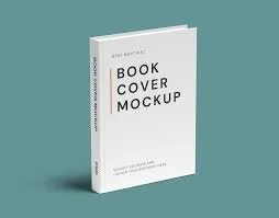 A white paperback book with the title 'Book Cover Mockup' on the cover, standing upright against a teal background.