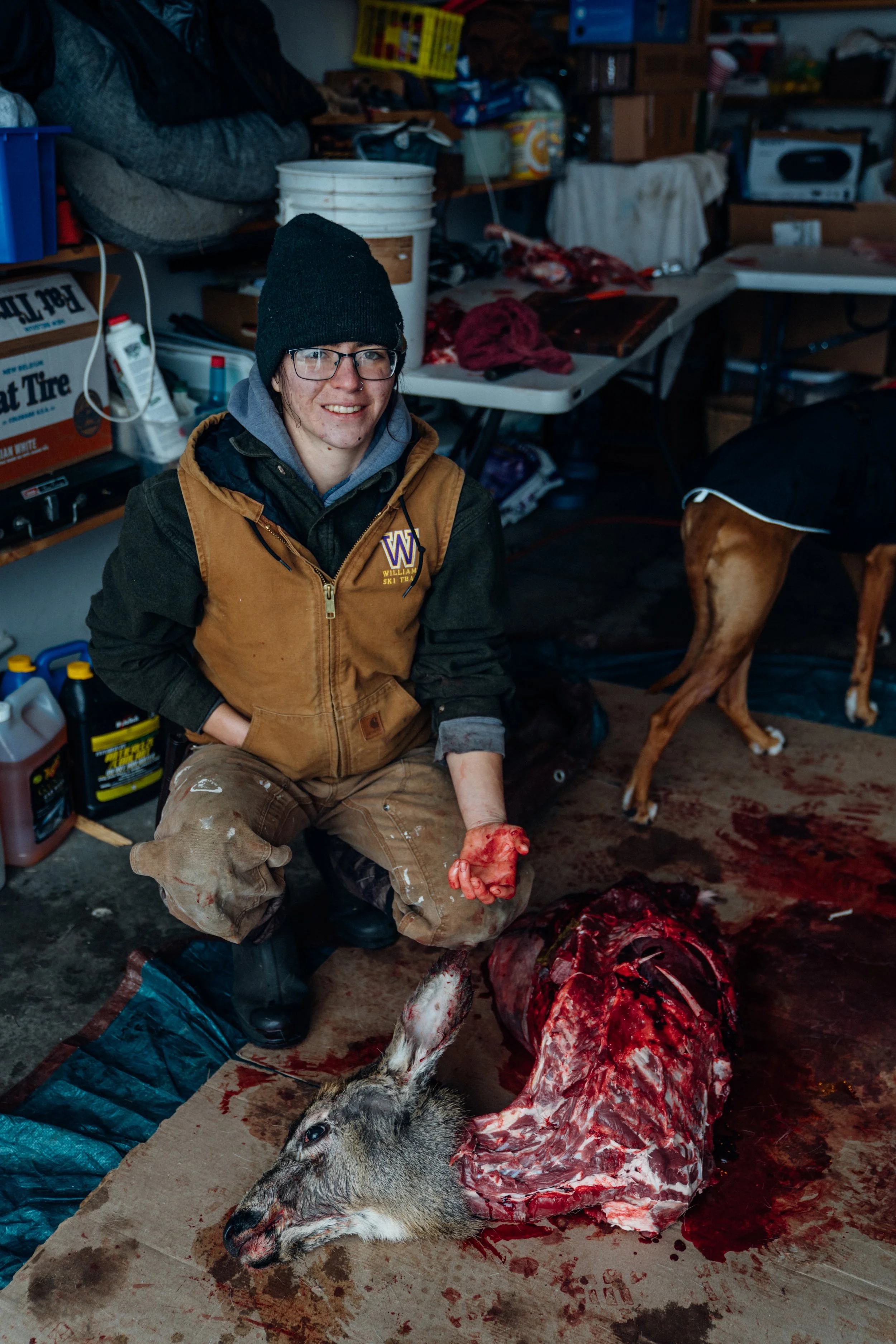 Ivy processing a roadkill deer, Winter 2024, Leavenworth, WA