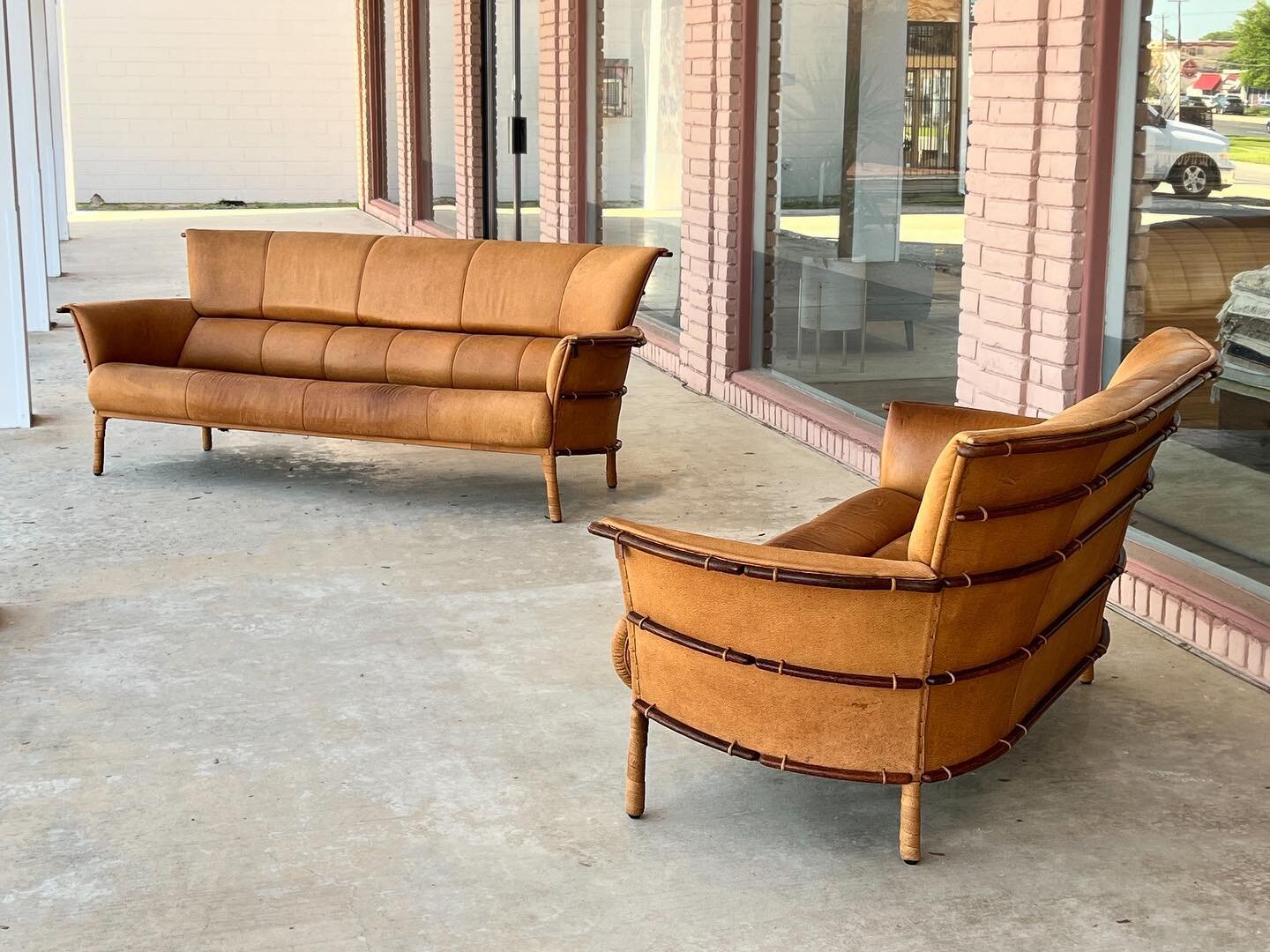 Just in 👌🏻
.
.
A pair of cognac leather &amp; palmwood &ldquo;Navajo&rdquo; sofas by Pacific Green, c. 1990s. Each sofa is in original condition and shows a beautiful patina. The ribbed palmwood frame replicates the canoe building techniques of Nat