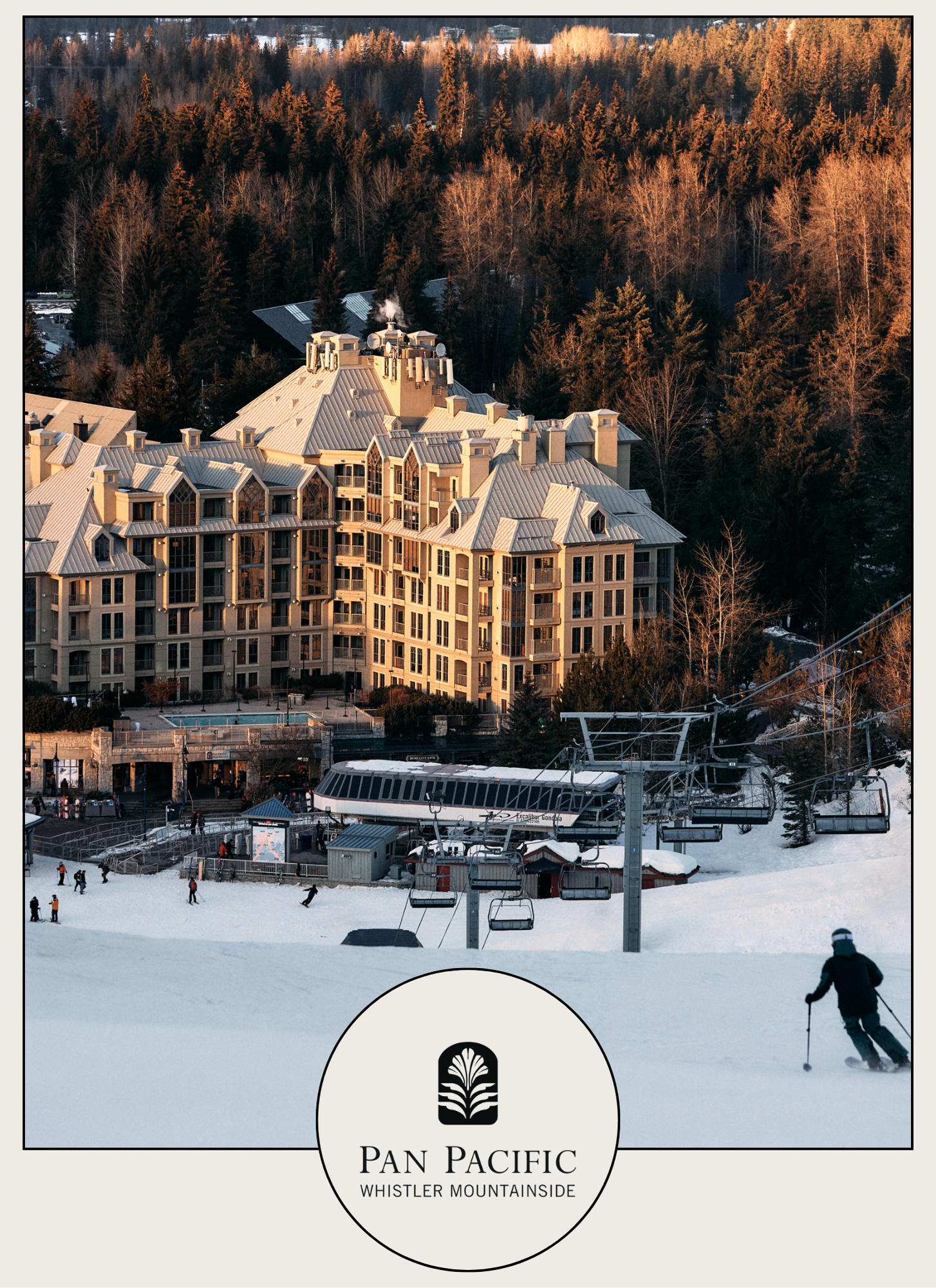 Exterior image of hotel, Pan Pacific Whistler Mountainside, and the base of a mountain with a person skiing