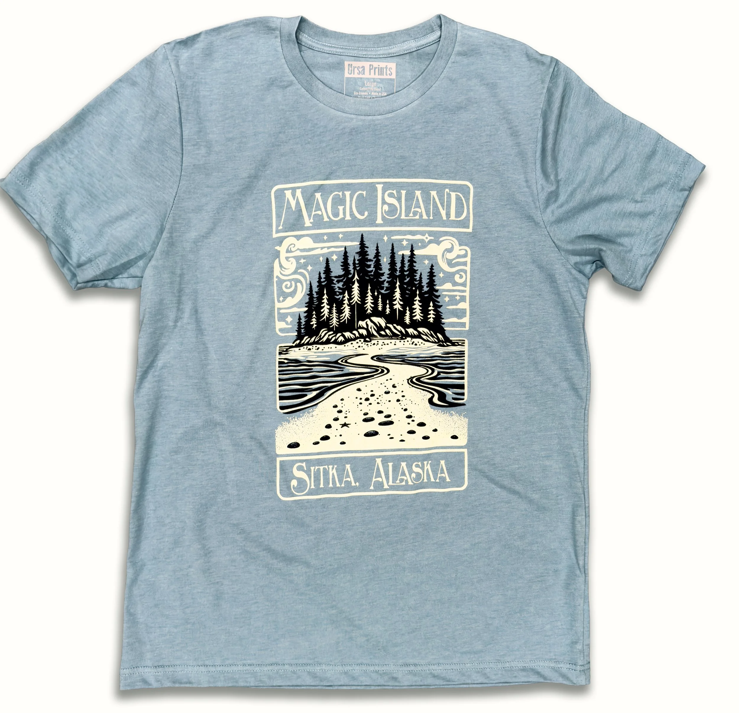 Two-color Magic Island screen print in black and creamy white ink on a Heather Blue Lagoon Bella + Canvas t-shirt.
