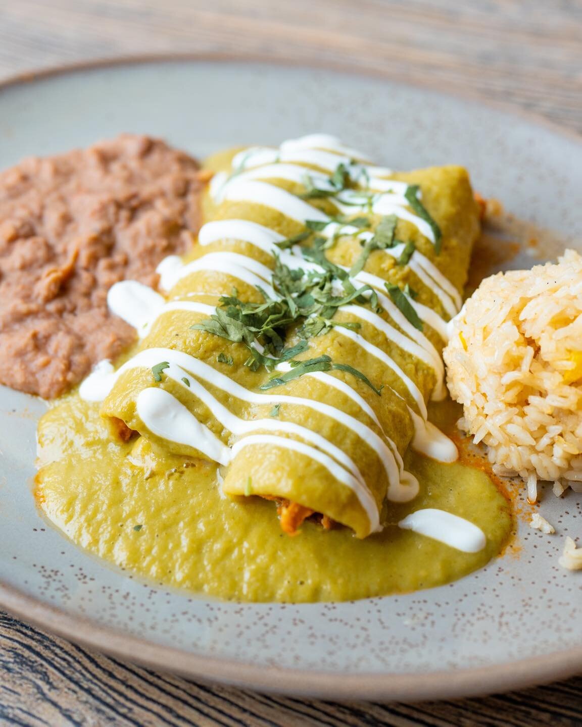 Get ready to spice up your life with our mouth-watering enchiladas! 🌶️🌮 Come and experience the authentic flavors of Mexico at El Chile Caf&eacute; Y Cantina 🇲🇽 

#Enchiladas #MexicanFood #Foodie #AustinEats #TexMex #AustinTexas