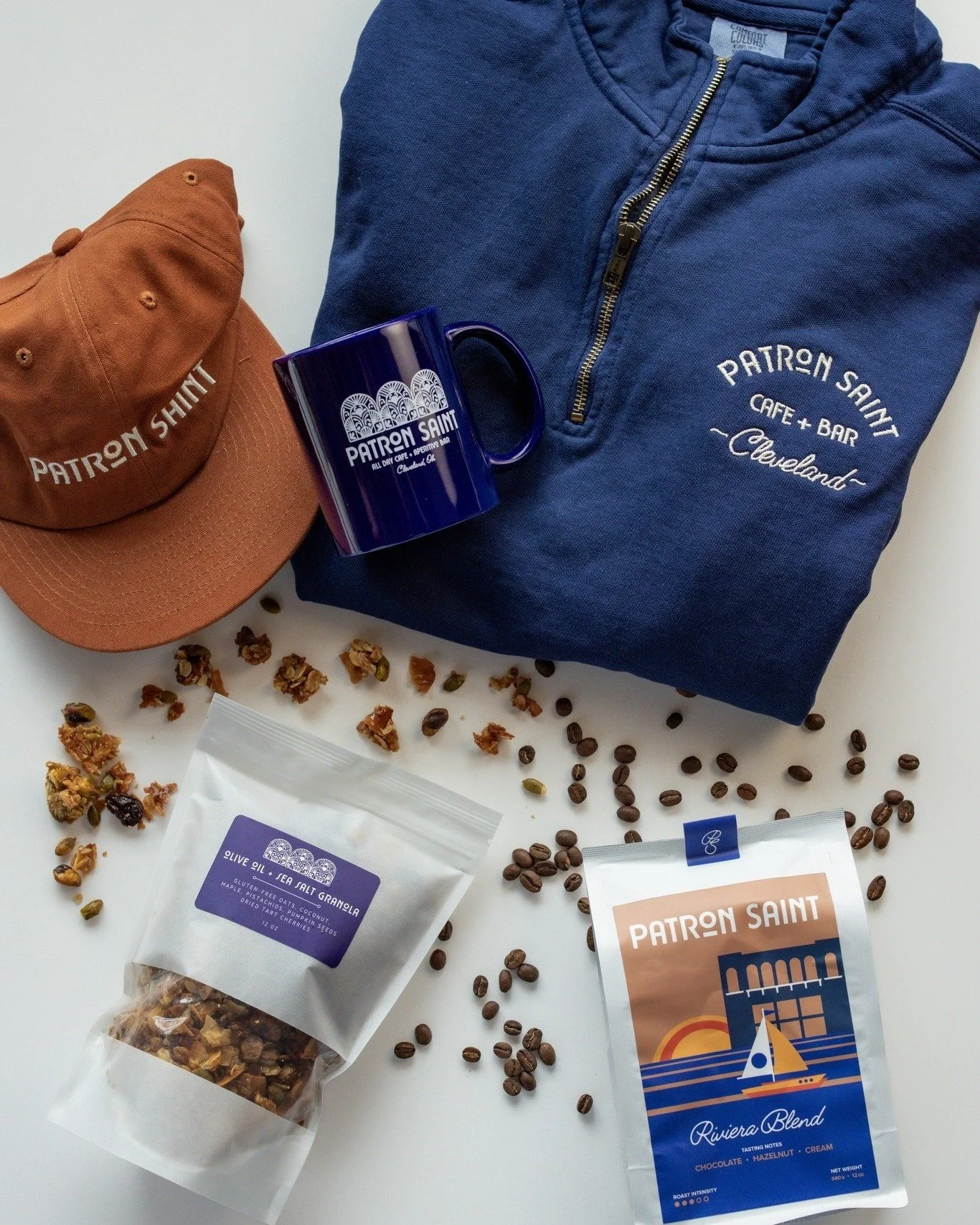 Give the gift of Patron Saint this holiday season! 🎁 Shop our selection of the comfiest shirts, sweatshirts, and hats, as well as our delicious house-made granola and bags of fresh-roasted coffee (we can grind it for you!)

Gift cards also available
