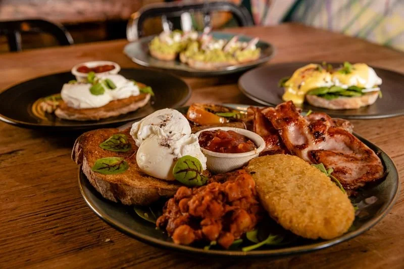 Big Breakfast at Brew Cafe & Wine Bar, with bacon, chorizo, two eggs, hash brown, grilled tomato, house beans and tomato relish on sourdough.