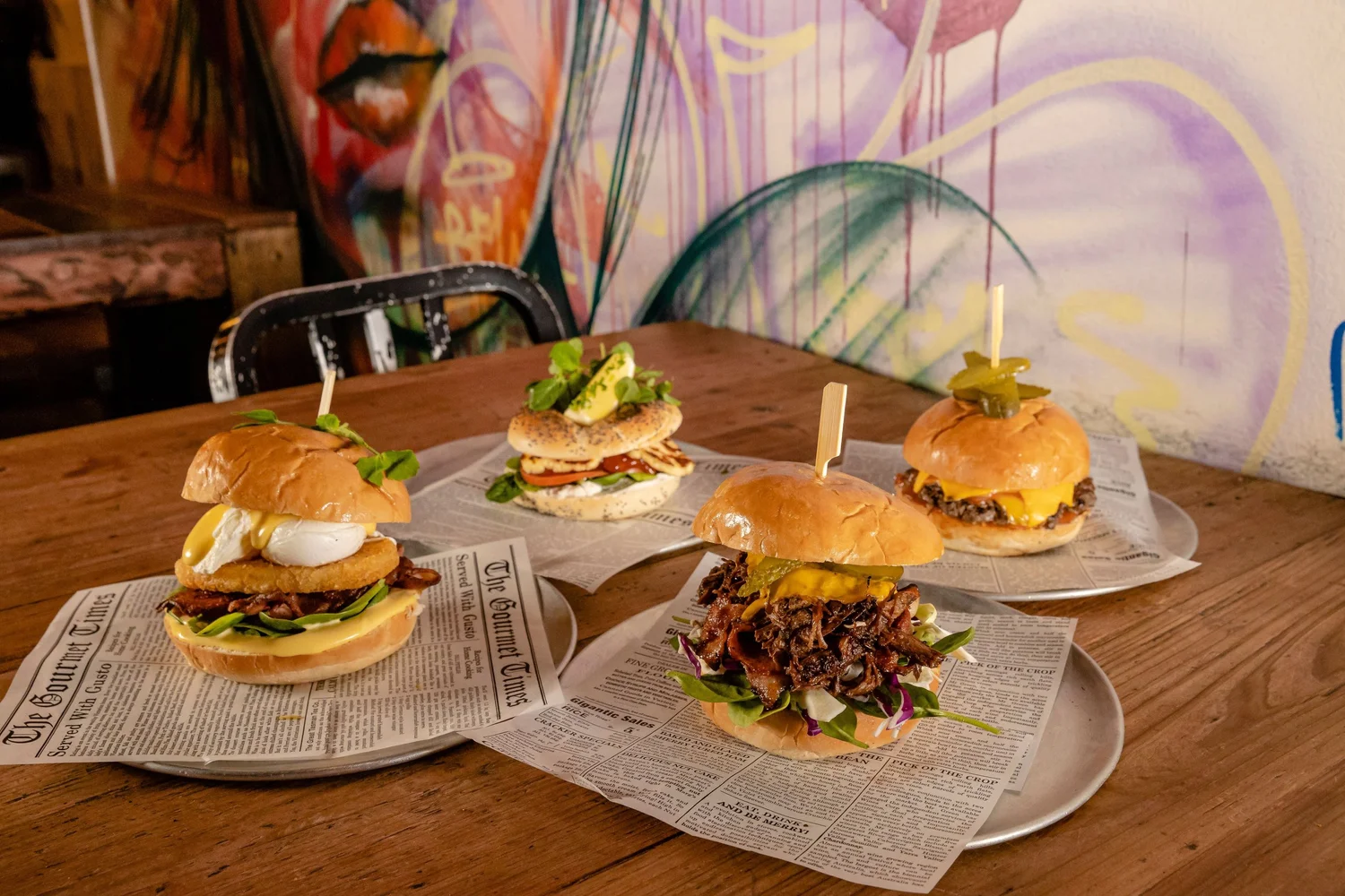 A spread of burgers at Brew Cafe & Wine Bar in Brisbane CBD