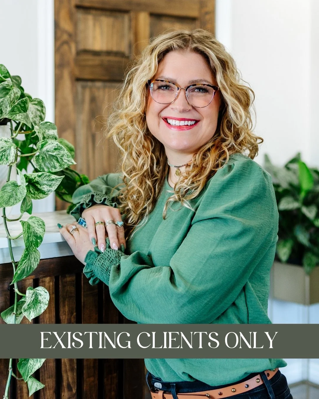 Melanie Moses, RP - A smiling woman with curly blonde hair, glasses, wearing a green blouse, and leaning on a wooden counter with a green leafy plant nearby and a caption that reads "Currently Unavailable."