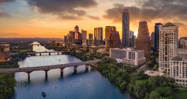 Austin, Texas skyline over Lady Bird Lake — Broomsmen provides Airbnb and short-term rental turnover cleaning across the Austin metro